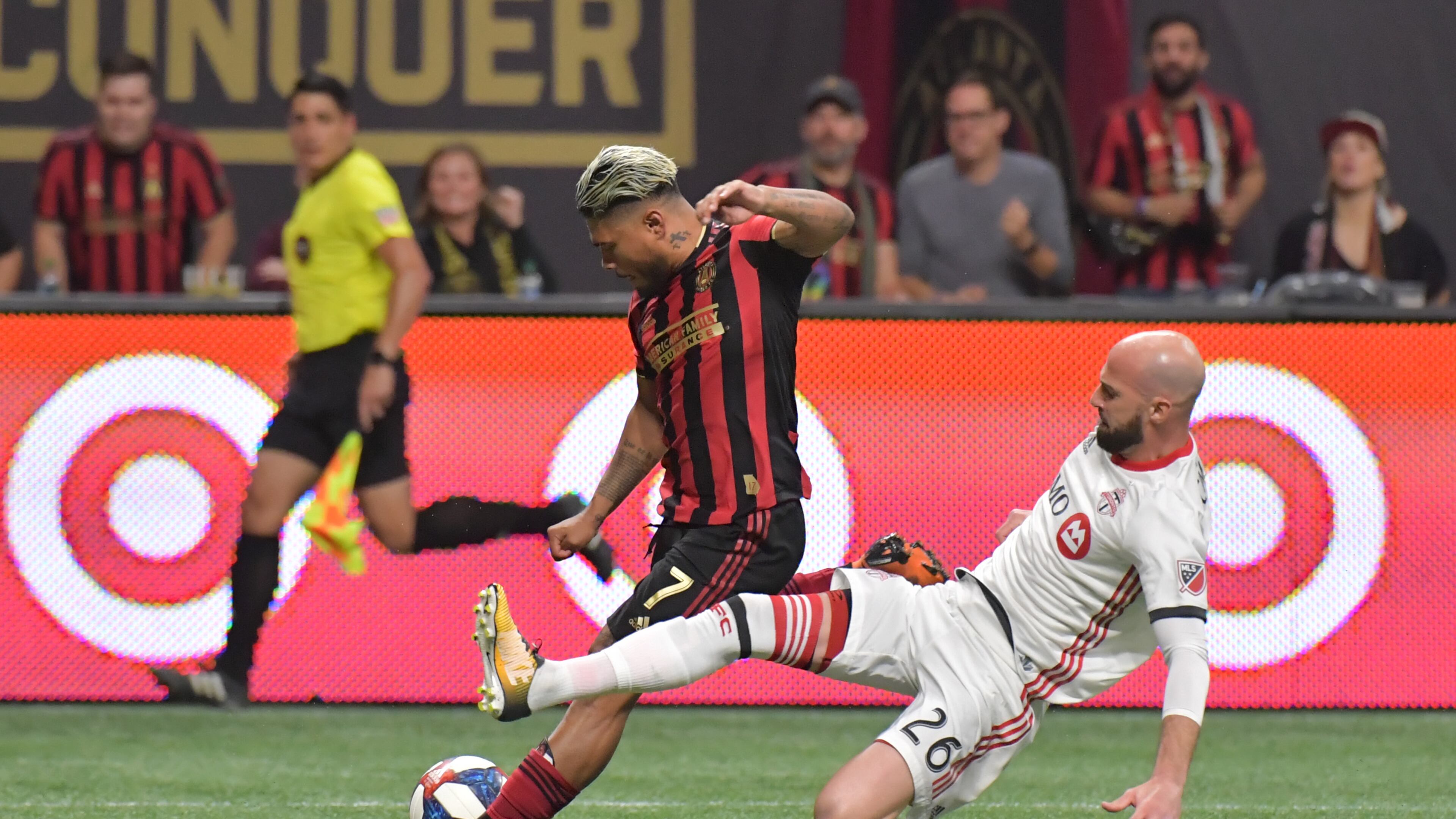 October 30, 2019 Atlanta - Atlanta United forward Josef Martinez (7) takes a shot as Toronto FC defender Laurent Ciman (26) defends in the second half during the Eastern Conference Final soccer match at Mercedes-Benz Stadium on Wednesday, October 30, 2019. Toronto FC won 2-1 over the Atlanta United. (Hyosub Shin / Hyosub.Shin@ajc.com)
