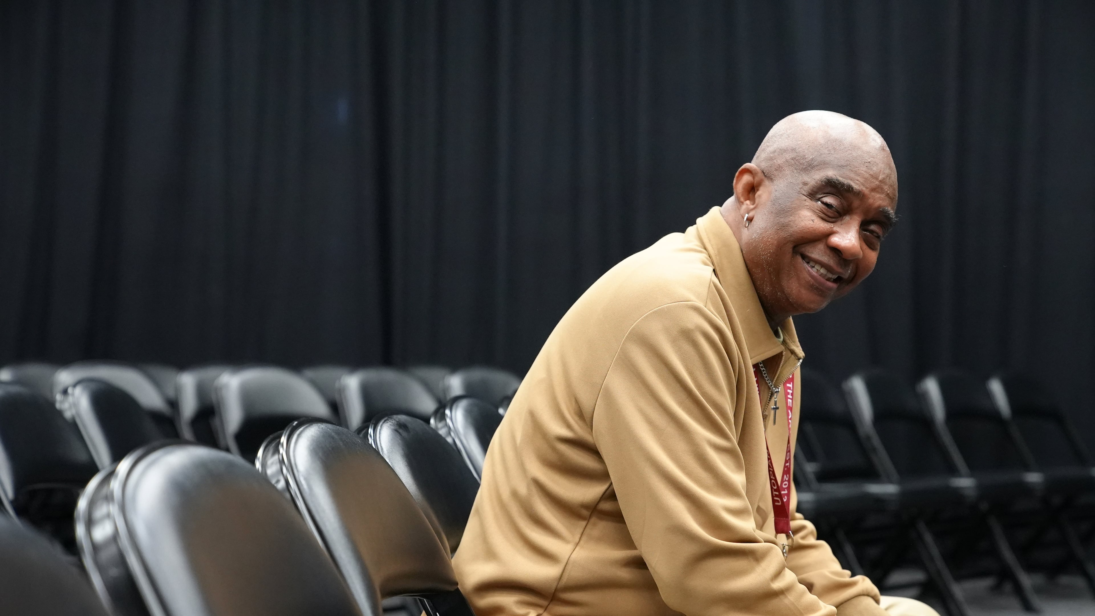 Freddie Hendricks, a middle school theater teacher at Utopian Academy for the Arts in Ellenwood, Ga., poses at the school on May 6, 2026. (Vinny Varsalona via AP)