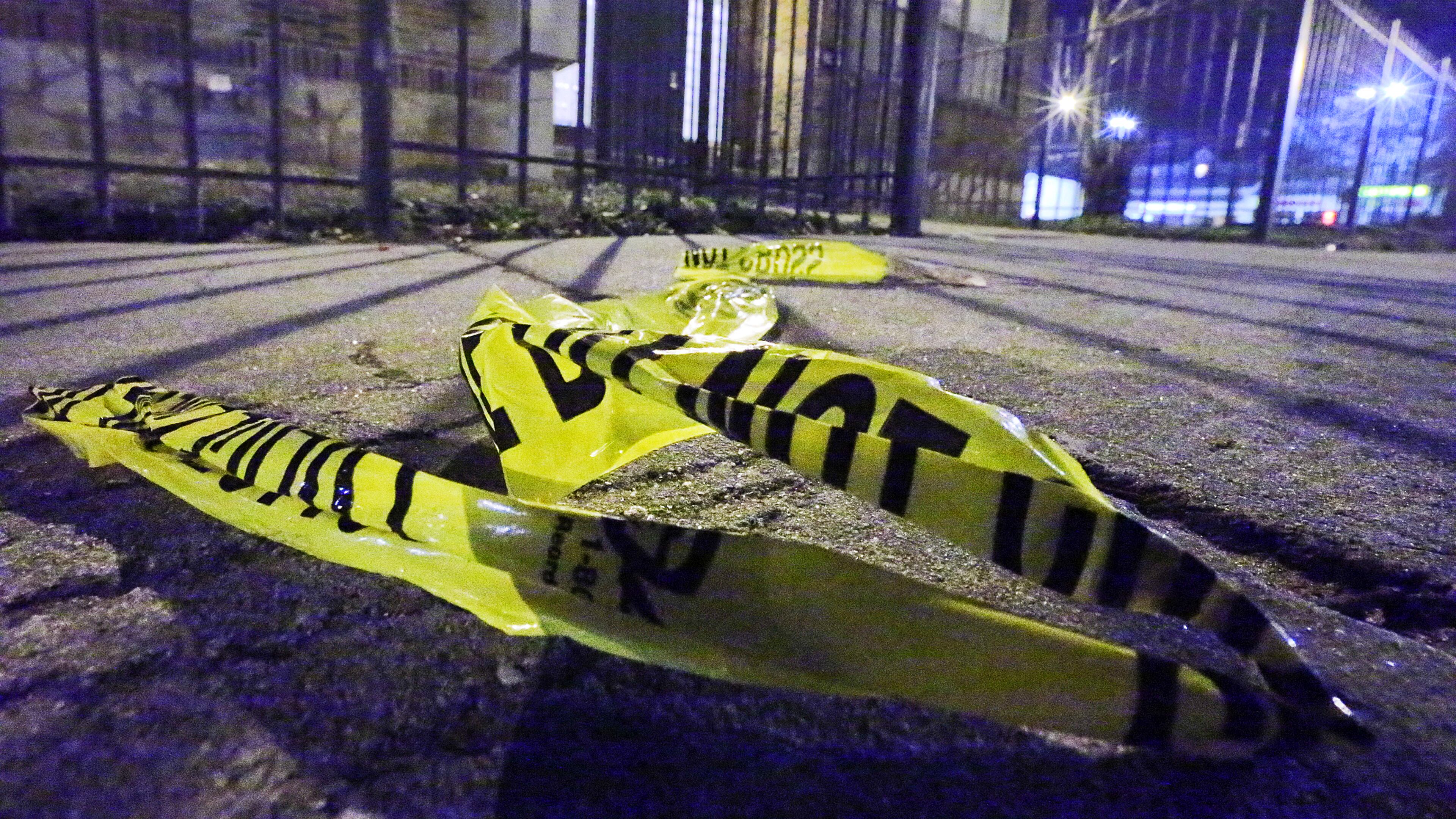 Detectives were still on the scene investigating some six hours after the shooting, which happened just before midnight Thursday. Channel 2 Action News reported that there were at least 68 evidence markers scattered throughout the area.