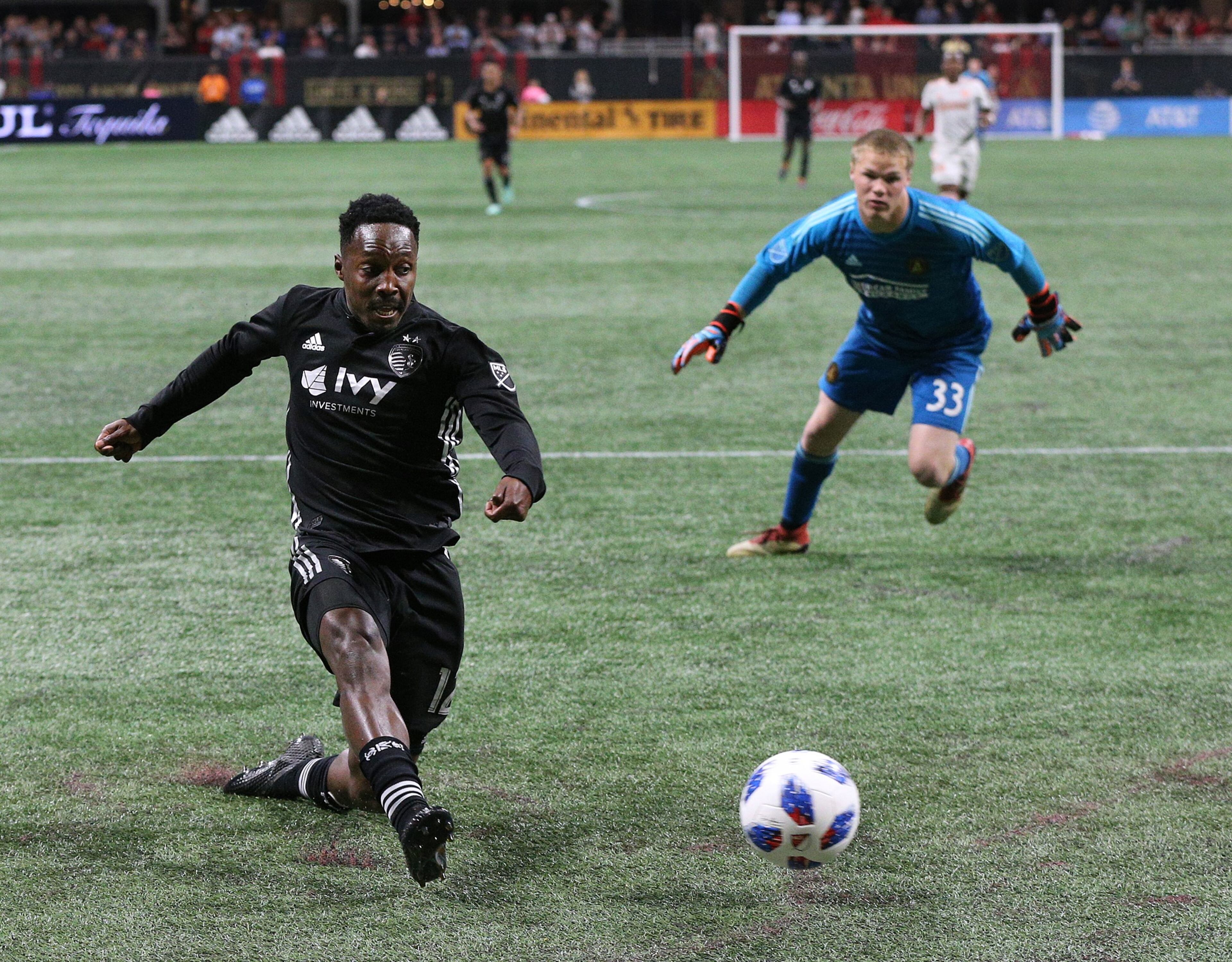 May 9, 2018 Atlanta: Sporting Kansas City forward Gerso Fernandes scores a goal past Atlanta United goalkeeper Paul Christensen for a 2-0 lead during the second half in a MLS soccer match on Wednesday, May 9, 2018, in Atlanta. SKC won the game 2-0. Curtis Compton/ccompton@ajc.com