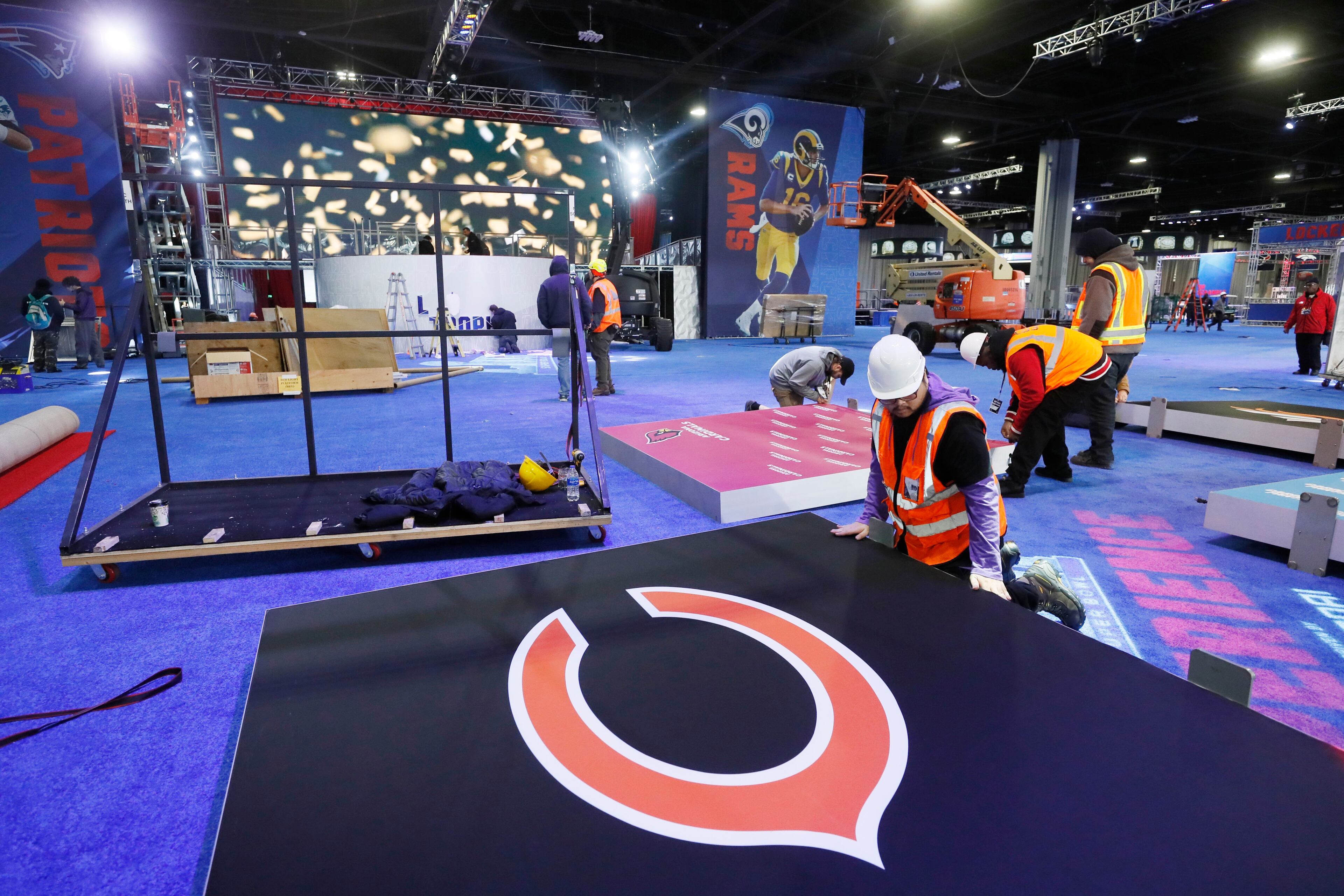 1/25/19 - Atlanta - Crews work on an attraction inside the Super Bowl Experience in GWCC. Super Bowl LIII's official fan attractions, Super Bowl LIVE presented by Verizon, Super Bowl Experience Driven by Hyundai and NFL Shop at Super Bowl LIII presented by Visa, open Saturday. Bob Andres / bandres@ajc.com