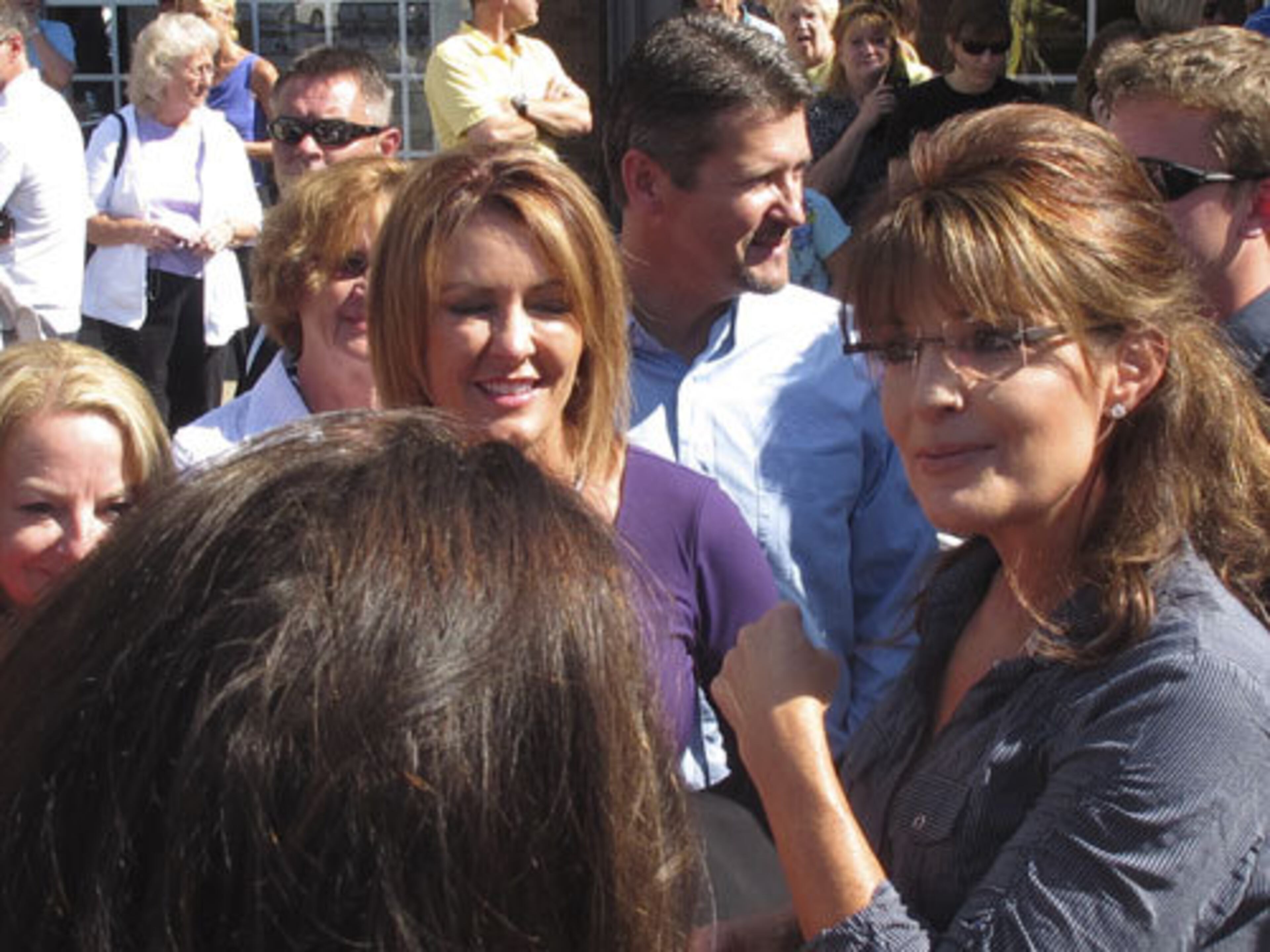 Sarah Palin speaks with fans outside the opera house. Atlantans will get the chance to see the Palin documentary "The Undefeated" when it debuts here July 15.