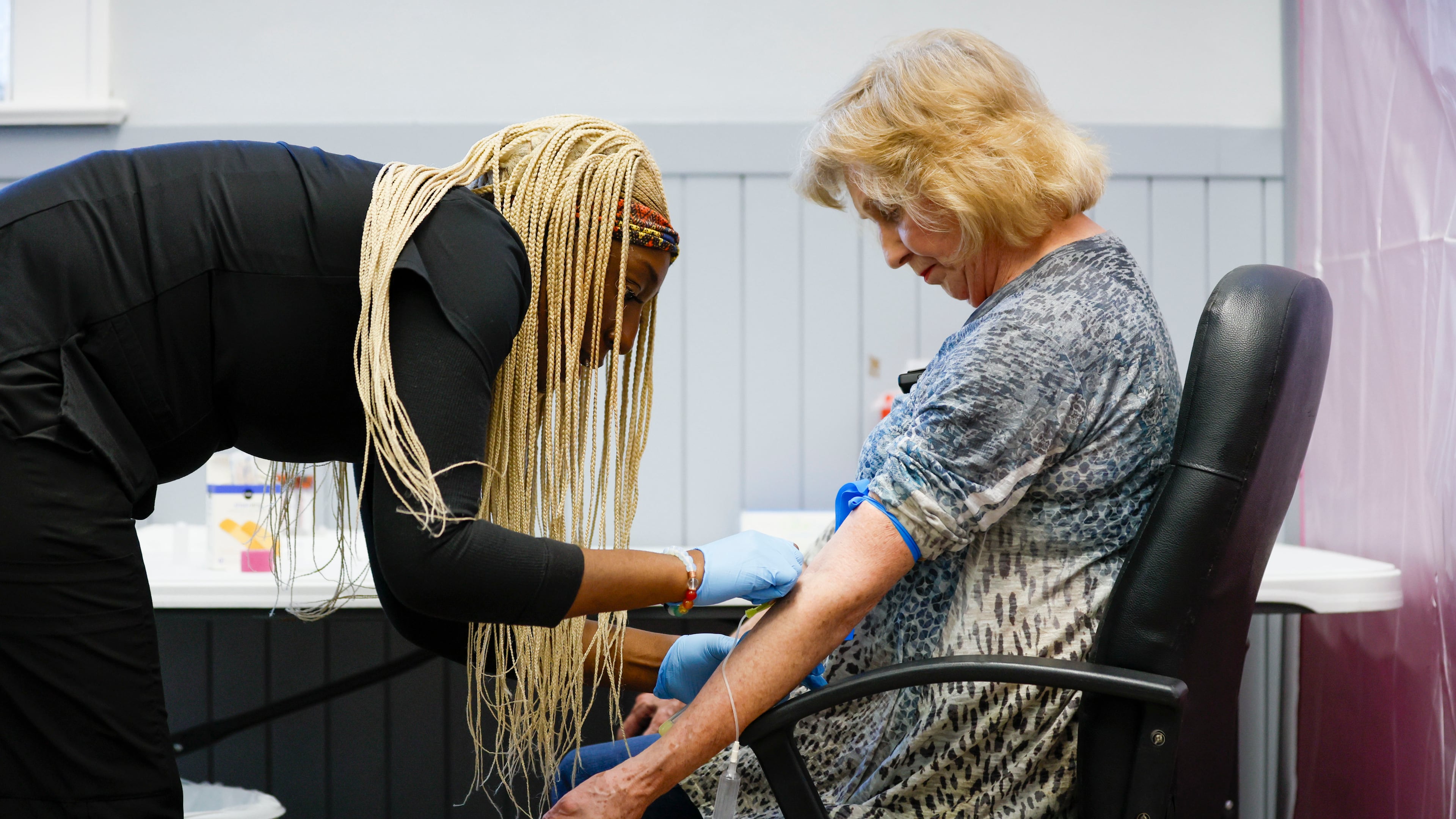 Phlebotomist Chantae Knowles conducted a blood screening for Rome resident Delores Brewer as part of a study led by researchers from Emory University’s Rollins School of Public Health. The study aims to investigate the presence of ‘forever chemicals.’
(Miguel Martinez/ AJC)