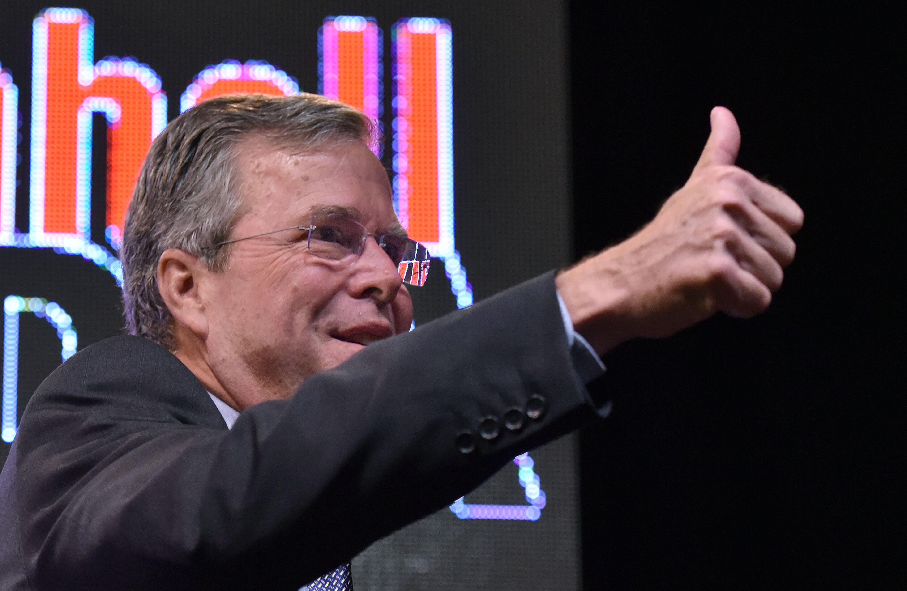 August 8, 2015 Atlanta - Former Florida Gov. Jeb Bush gives a thumbs as he leaves the stage during the RedState Gathering at Intercontinental Buckhead Hotel on Saturday, August 8, 2015. The organizer of the RedState Gathering has rescinded the Republican presidential candidate’s invitation to speak at a Saturday evening rally at the College Football Hall of Fame. Erick Erickson said the billionaire’s comments about Fox News anchor Megyn Kelly were “a bridge too far.” Trump told CNN on Friday that “you could see there was blood coming out of her eyes. Blood coming out of her wherever” as she questioned him during Thursday’s Republican presidential debate.HYOSUB SHIN / HSHIN@AJC.COM