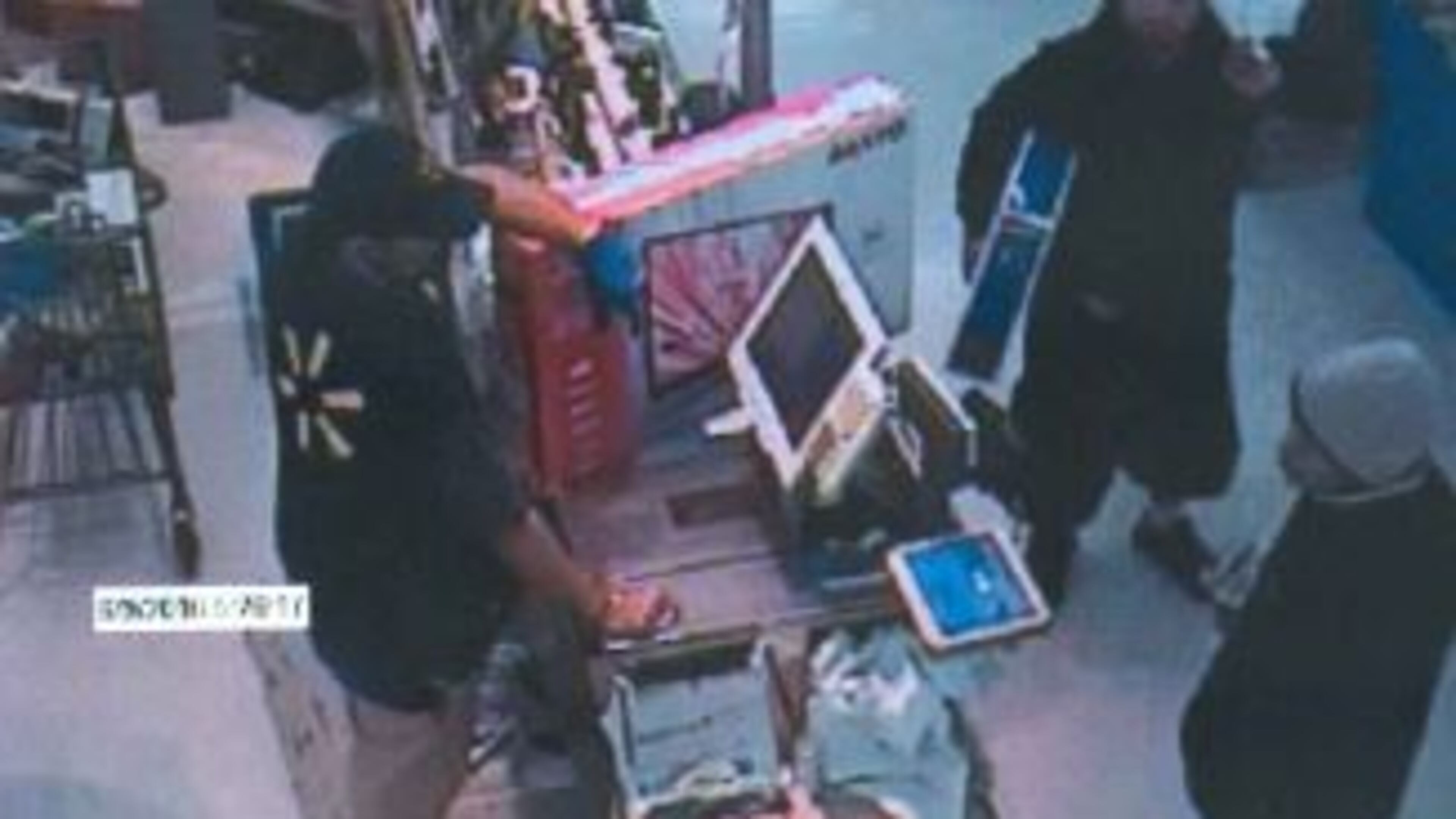 This Wal-Mart surveillance photo shows two of the men sought in connection with a home invasion in Norcross on June 9, 2016. (Credit: Gwinnett County Police)