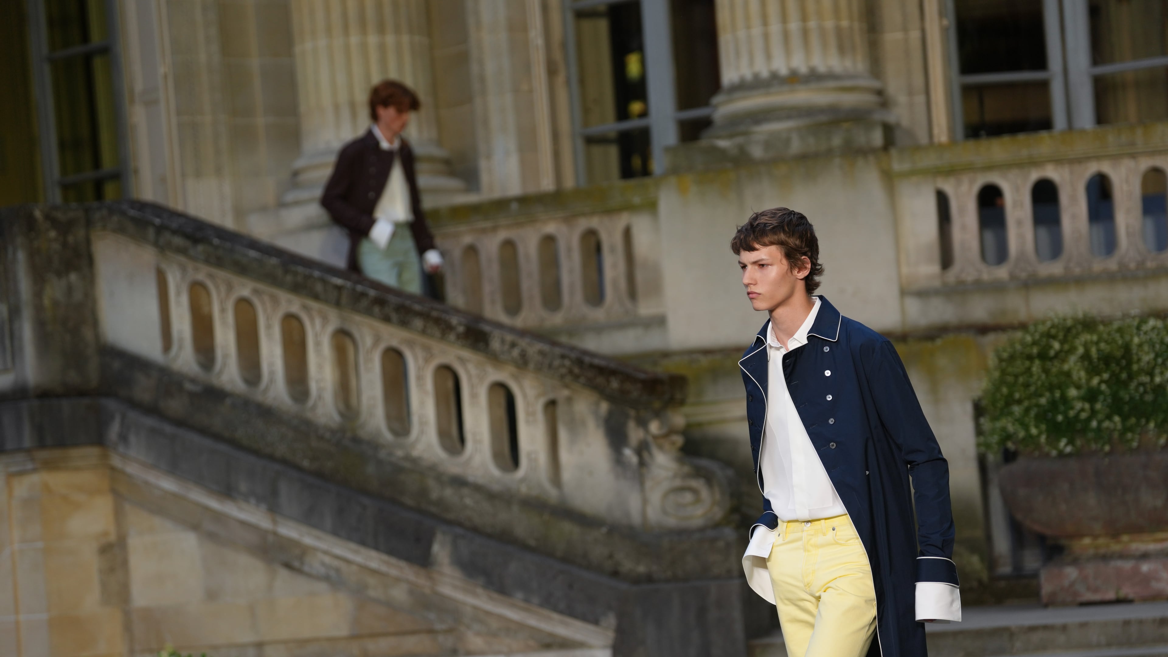 Models wear creations as part of the Dior Homme Spring Summer 2027 collection presented in Paris, France, Wednesday, June 24, 2026. (AP Photo/Aurelien Morissard)