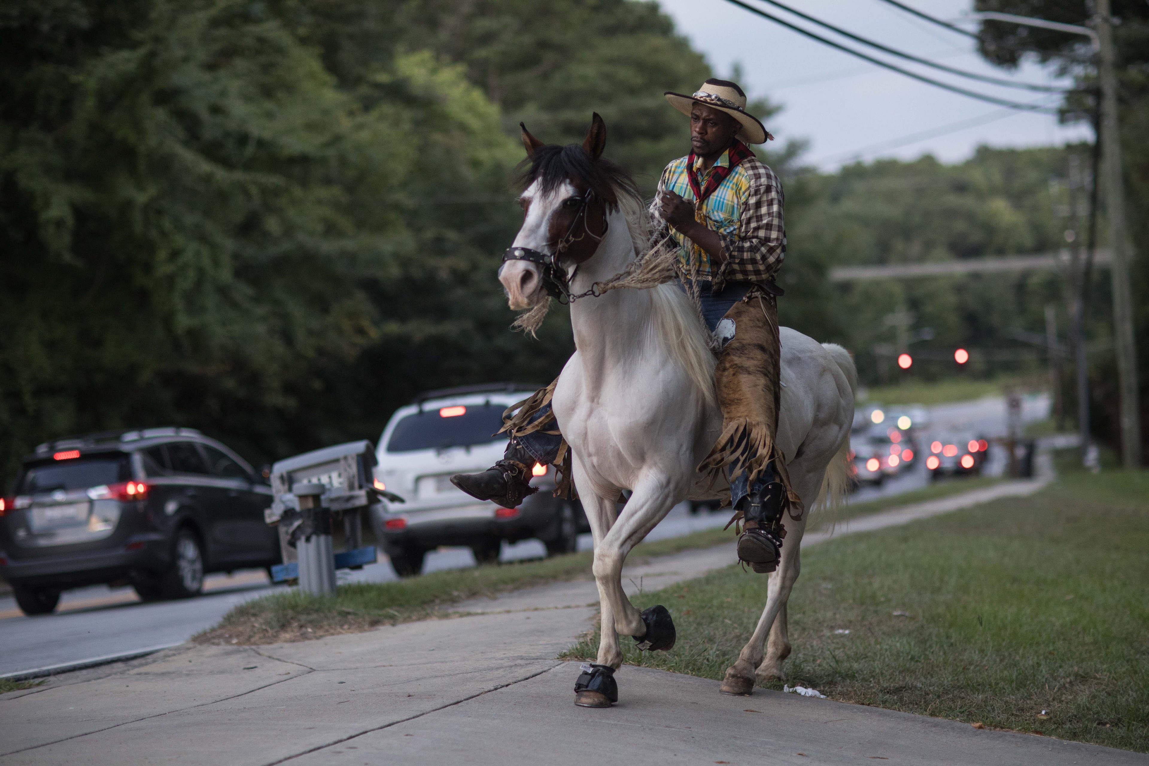Arkansas Dave rides his horse on a ranch off of Flat Shoals Parkway, Tuesday, July 30, 2019, in Union City. BRANDEN CAMP/SPECIAL