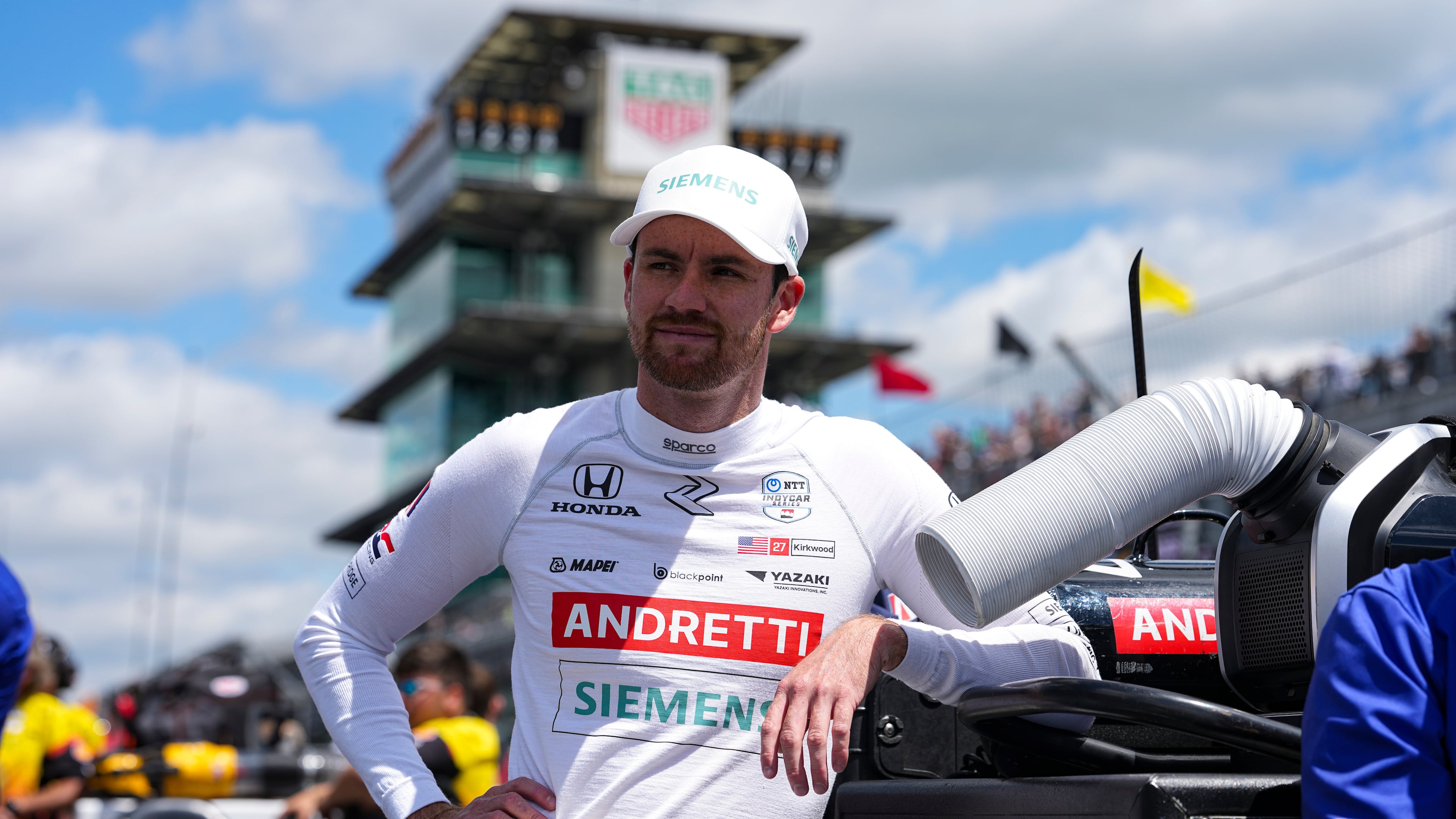 FILE - Kyle Kirkwood leans on a tool box as he waits for is turn during qualification for the Indianapolis 500 auto race at Indianapolis Motor Speedway in Indianapolis, May 17, 2025. (AP Photo/Michael Conroy, File)