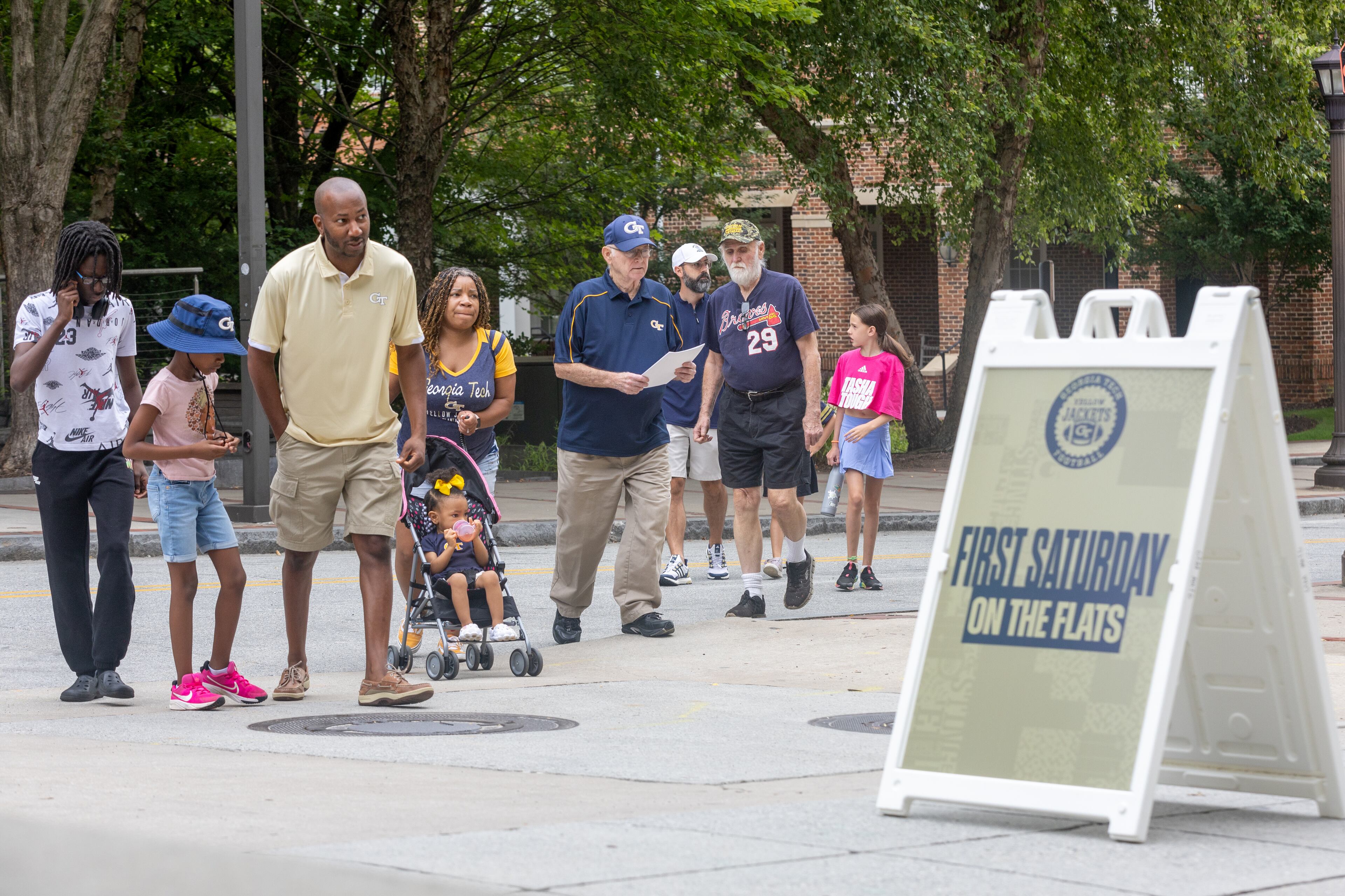 Fans head into Bobby Dodd Stadium for the Georgia Tech football’s annual First Saturday on The Flats in Atlanta July 27, 2024. (Steve Schaefer / AJC)