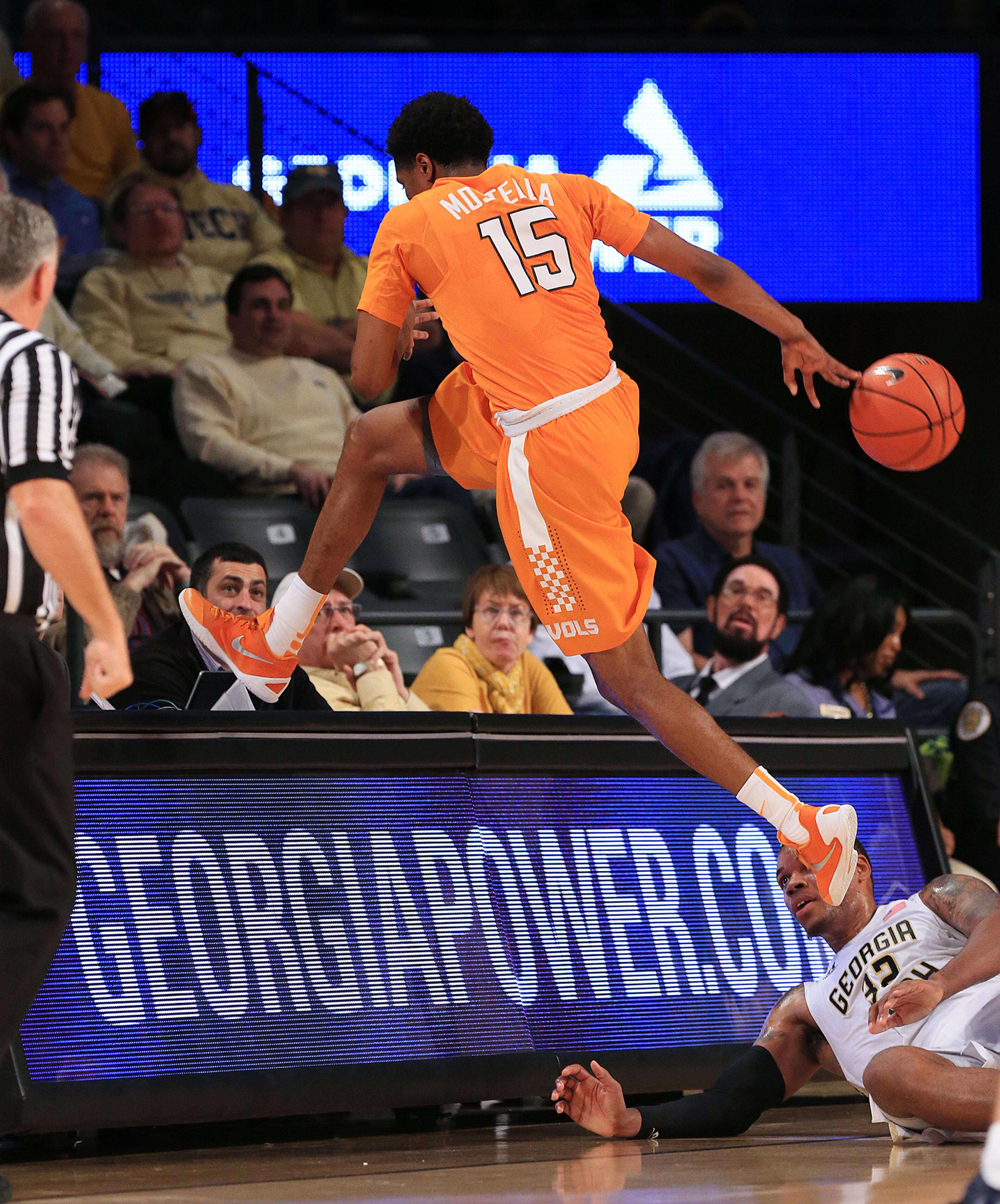 Tennessee guard Detrick Mostella goes into the crowd chasing a loose ball against Georgia Tech during the first half in a basketball game on Monday, Nov. 16, 2015 in Atlanta. Curtis Compton / ccompton@ajc.com