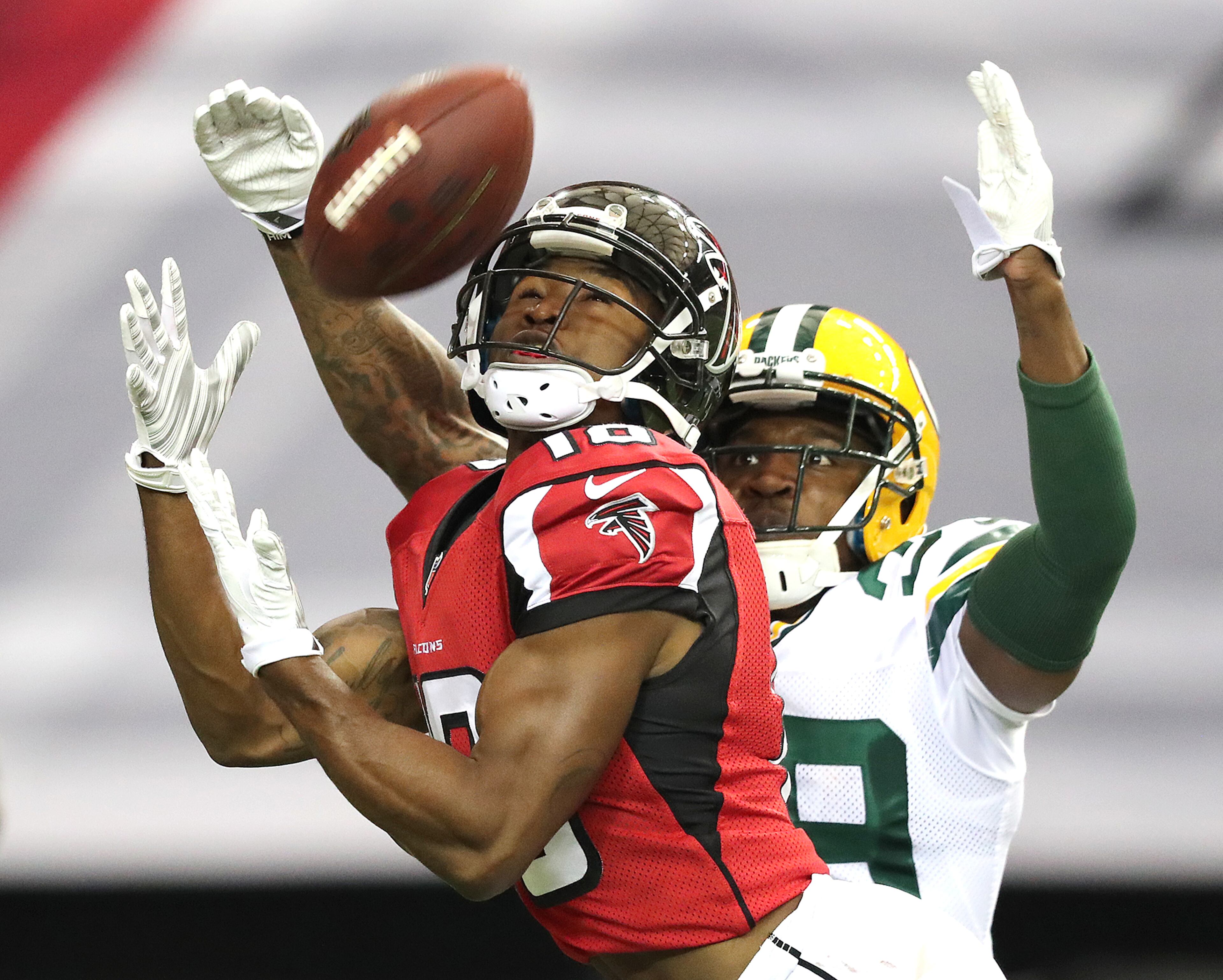 October 30, 2016 ATLANTA: Falcons wide receiver Taylor Gabriel hauls in a long touchdown pass from Matt Ryan past Pacers cornerback Demetri Goodson foa a 10-7 lead during the first quarter in an NFL football game on Sunday, Oct. 30, 2016, in Atlanta. Curtis Compton /ccompton@ajc.com