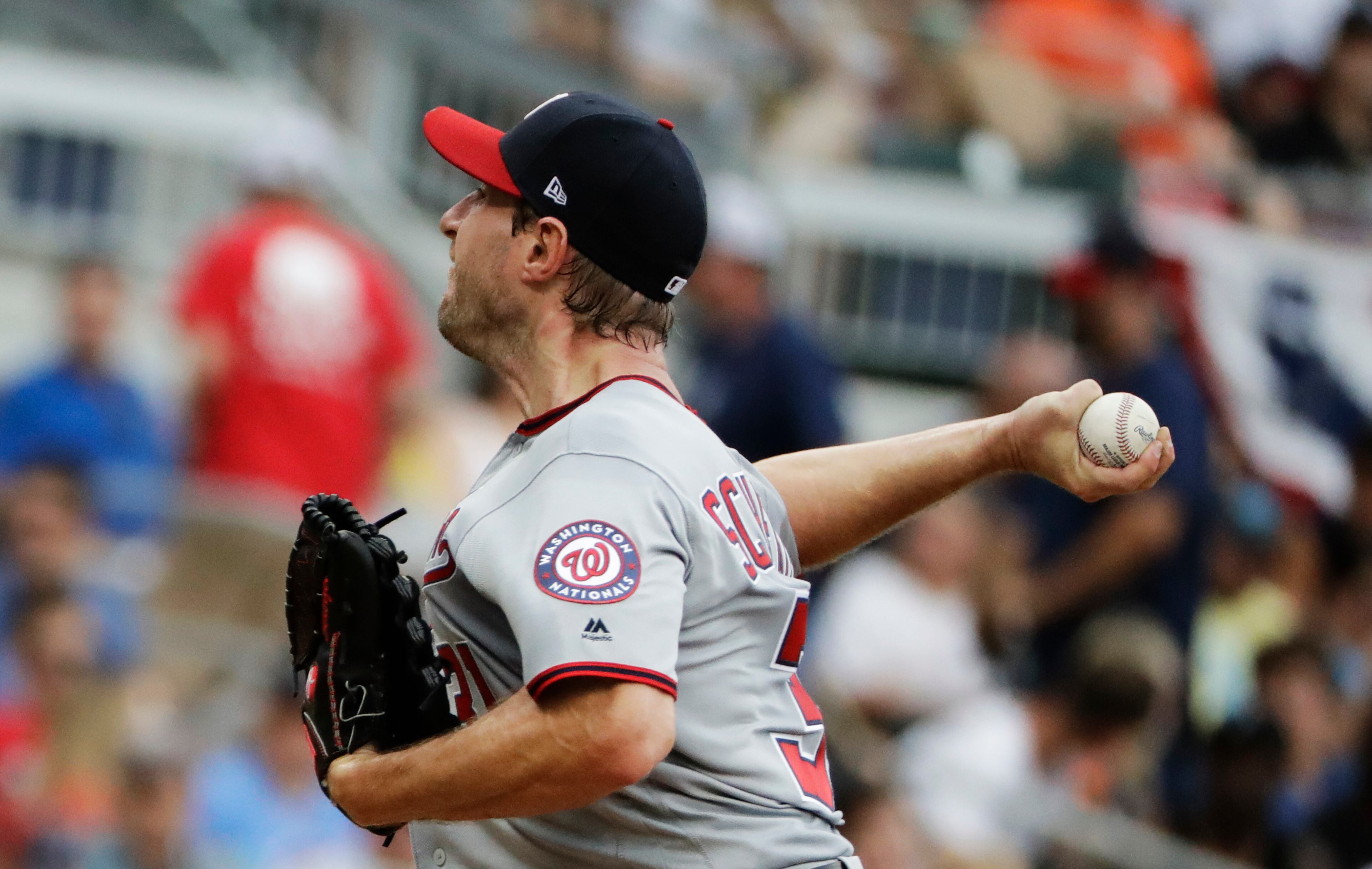 Washington Nationals starting pitcher Max Scherzer throws in the third inning of a baseball game against the Atlanta Braves in Atlanta, Saturday, May 20, 2017. (AP Photo/David Goldman)