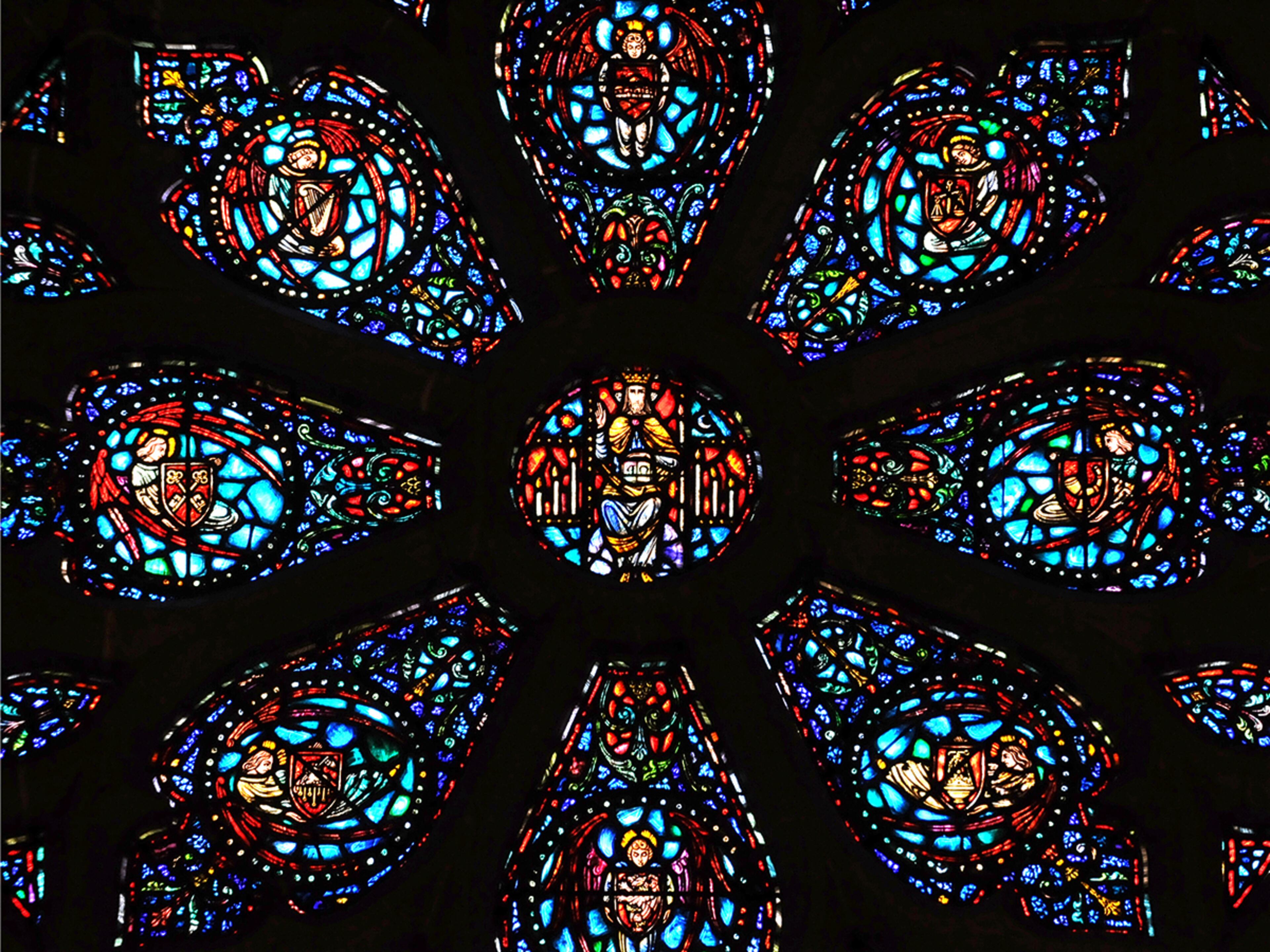A closer look at the Rose Window shows Jesus at the center surrounded by symbols of the Apocalypse, such as a trumpet, a set of scales, and a dragon in chains. And so it seems appropriate that we choose this place to say -- The End. (HYOSUB SHIN / HSHIN@AJC.COM)