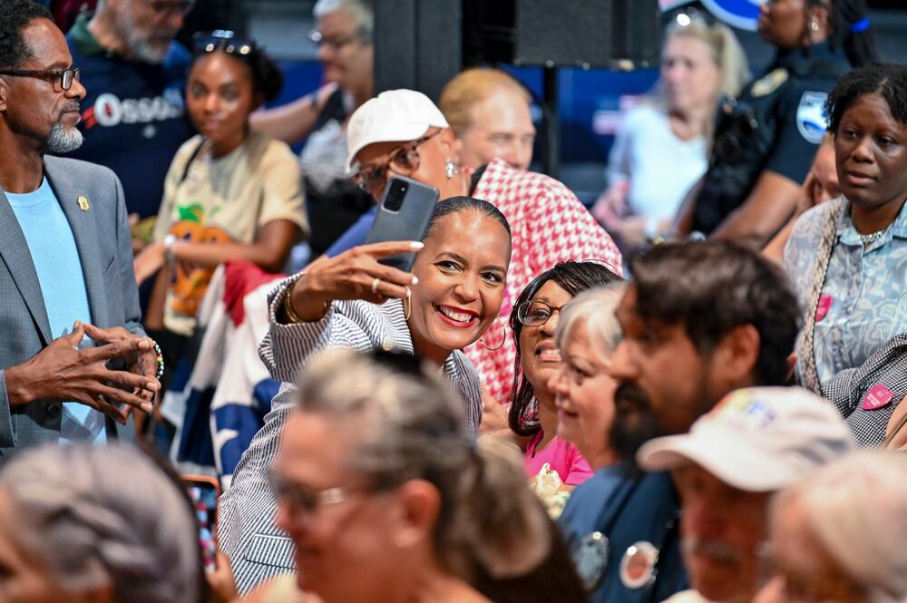 Democratic nominee for governor Keisha Lance Bottoms poses for a selfie at a rally in Savannah last month. (Sarah Peacock for the AJC)