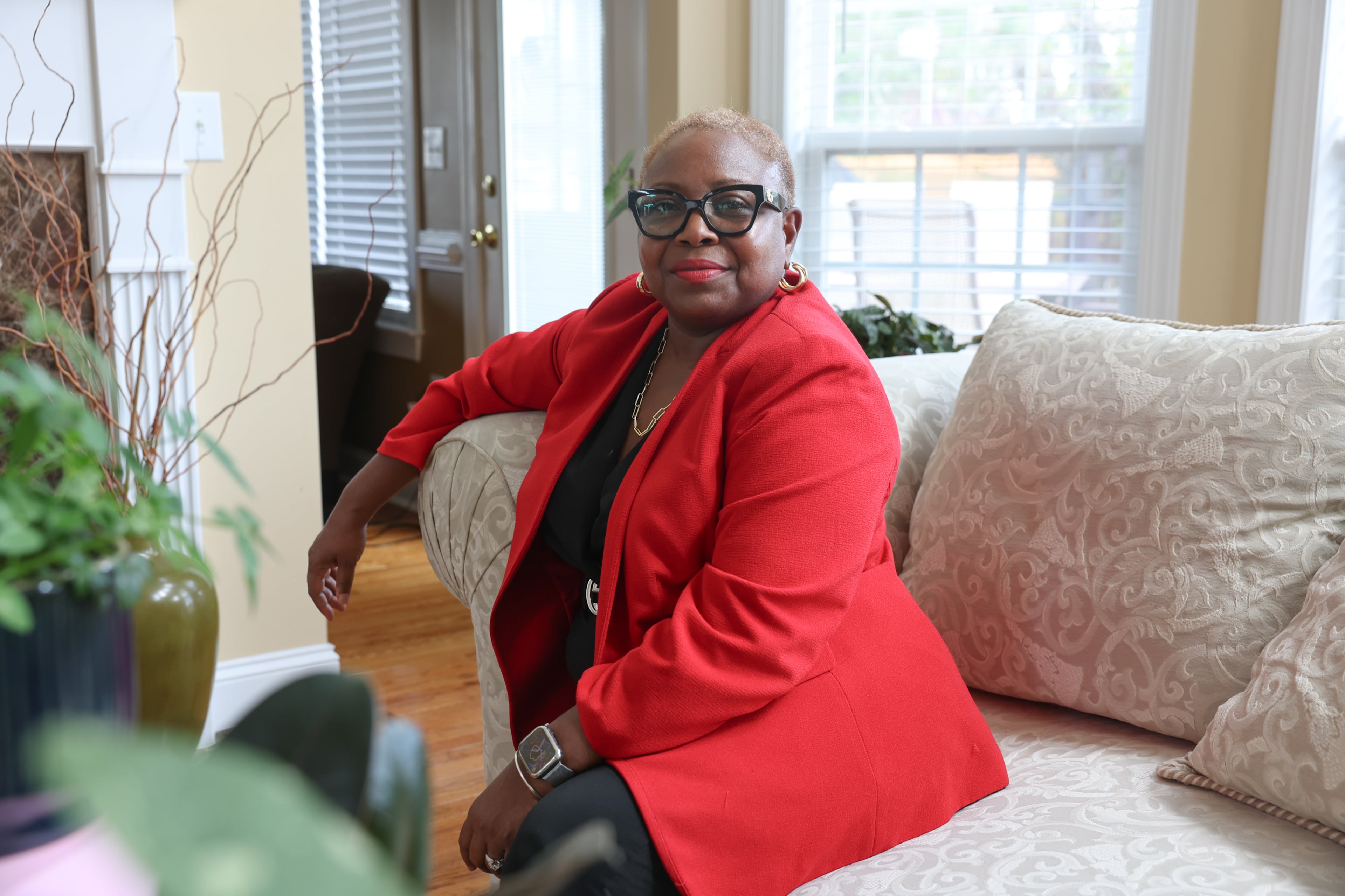 Brunessa Dayton, 56, poses for a portrait at her home in Powder Springs last month. (Arvin Temkar/AJC)