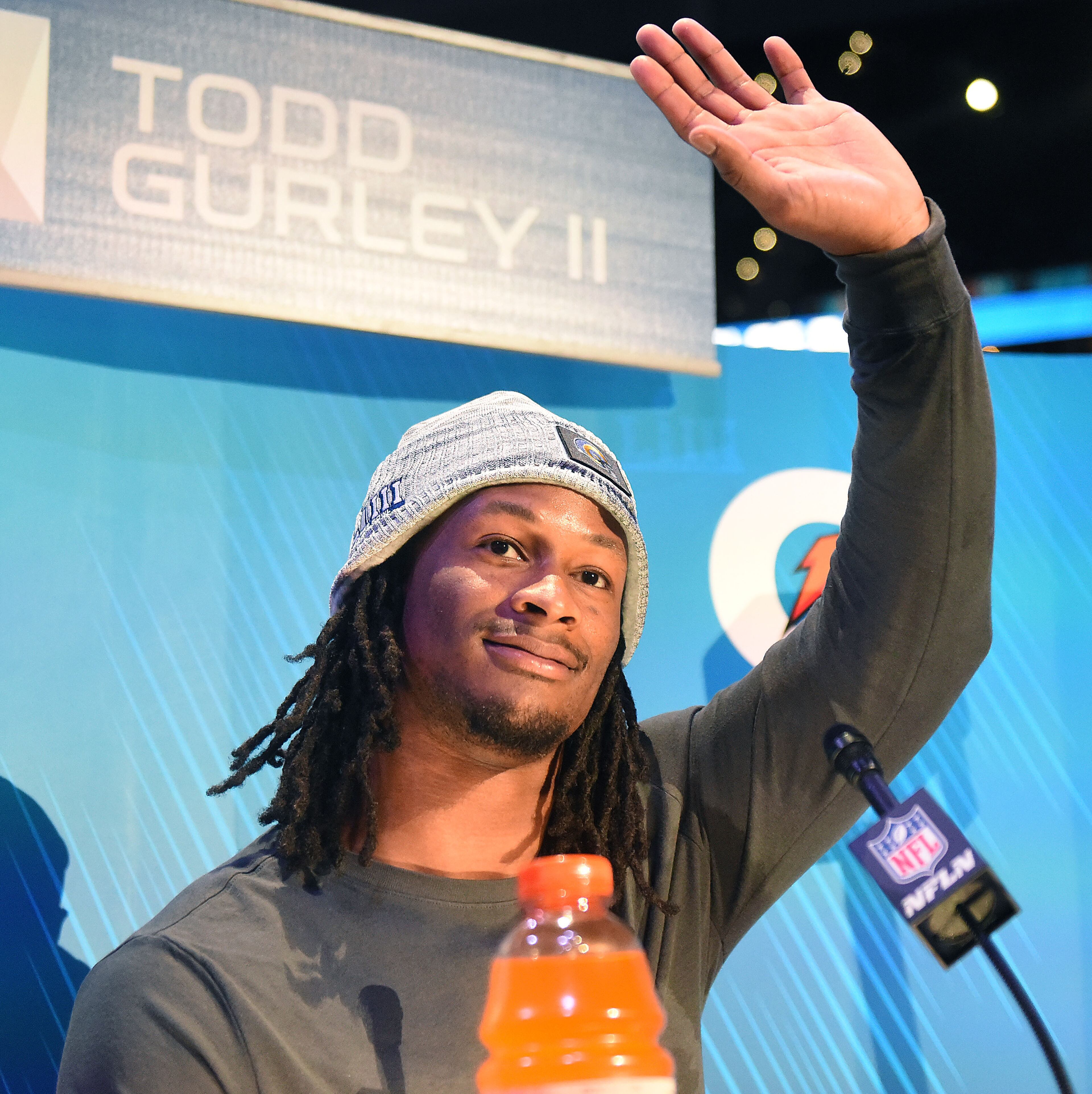 Rams running back Todd Gurley acknowledges the crowd during Monday's event. (Ryon Horne/rhorne@ajc.com)