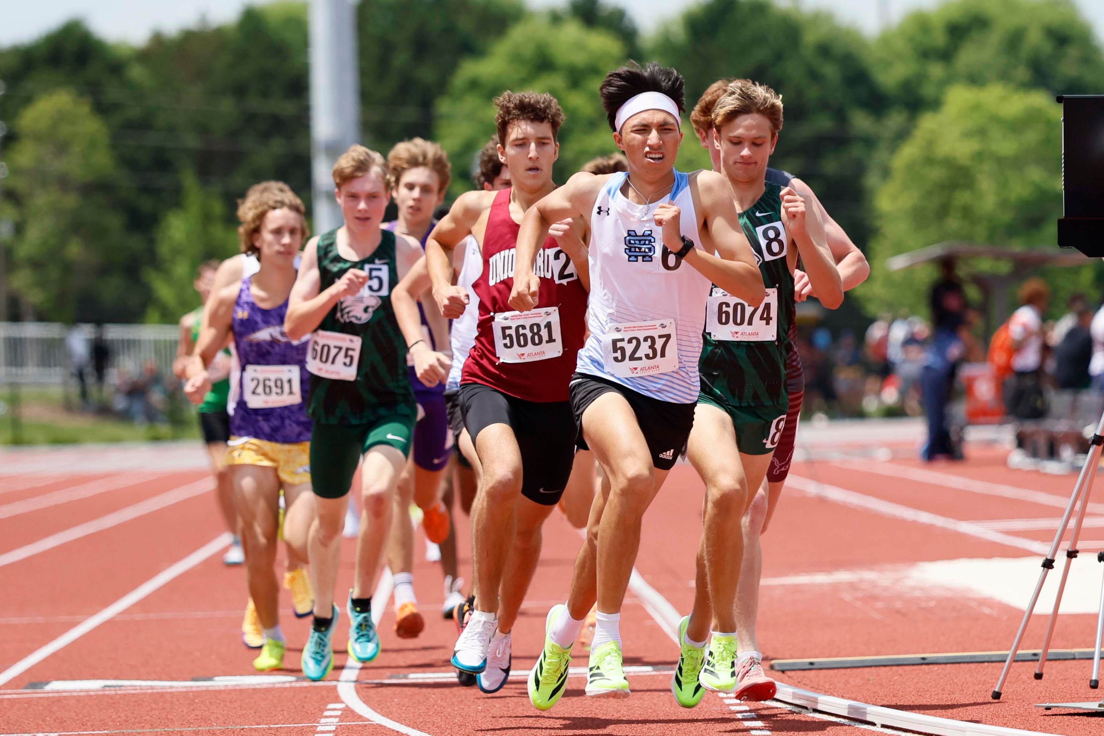 Runners participate in the Boys 1600-meter Run AAAA at the GHSA track and field state championships at UGA Spec Towns Track on Monday, May 11, 2026, in Athens.
(Miguel Martinez/AJC)