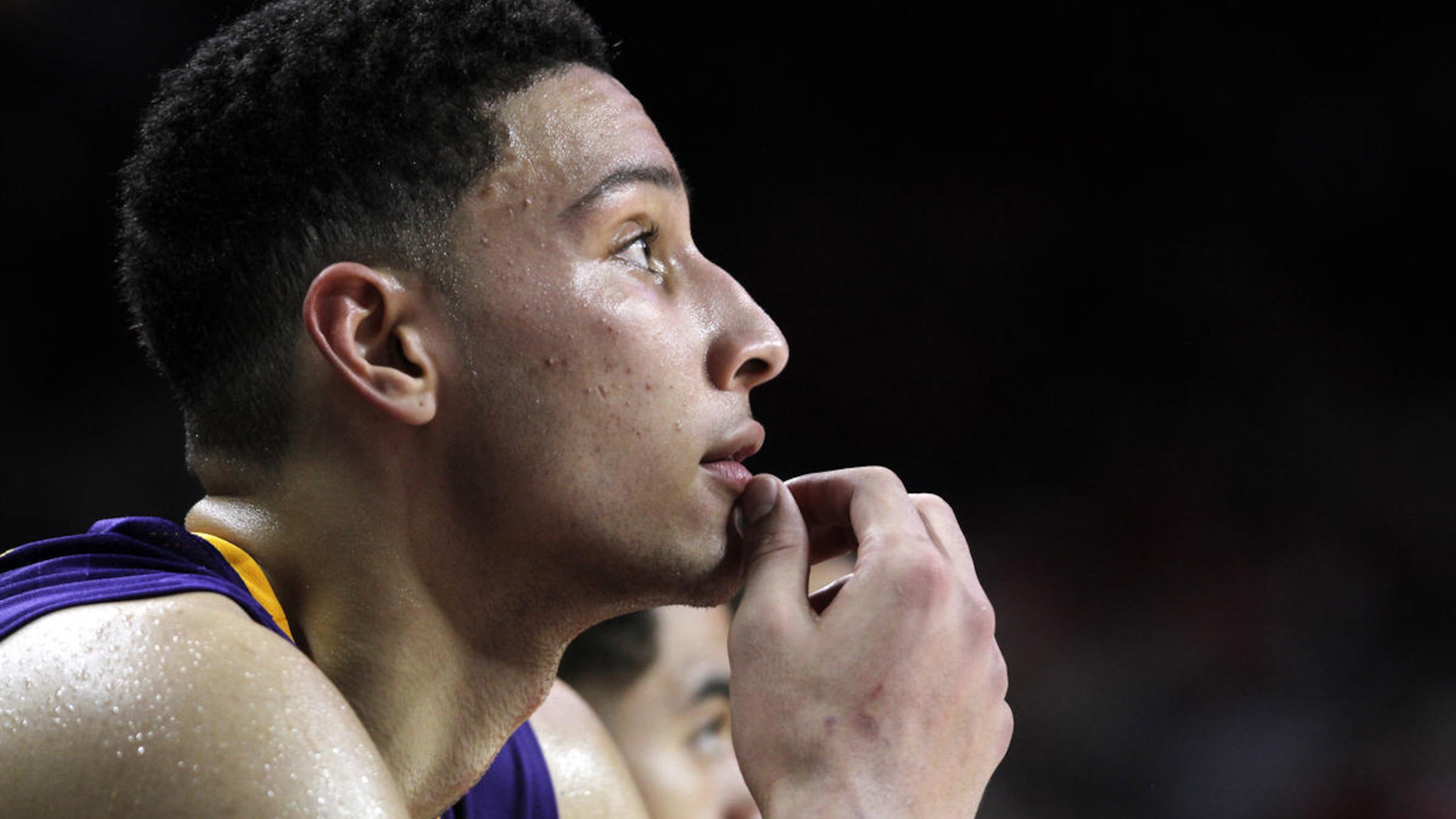 LSU's Ben Simmons watches from the bench with minutes left in an NCAA college basketball game against Arkansas, Tuesday, Feb. 23, 2016, in Fayetteville, Ark. Arkansas won 85-65. (AP Photo/Samantha Baker)
