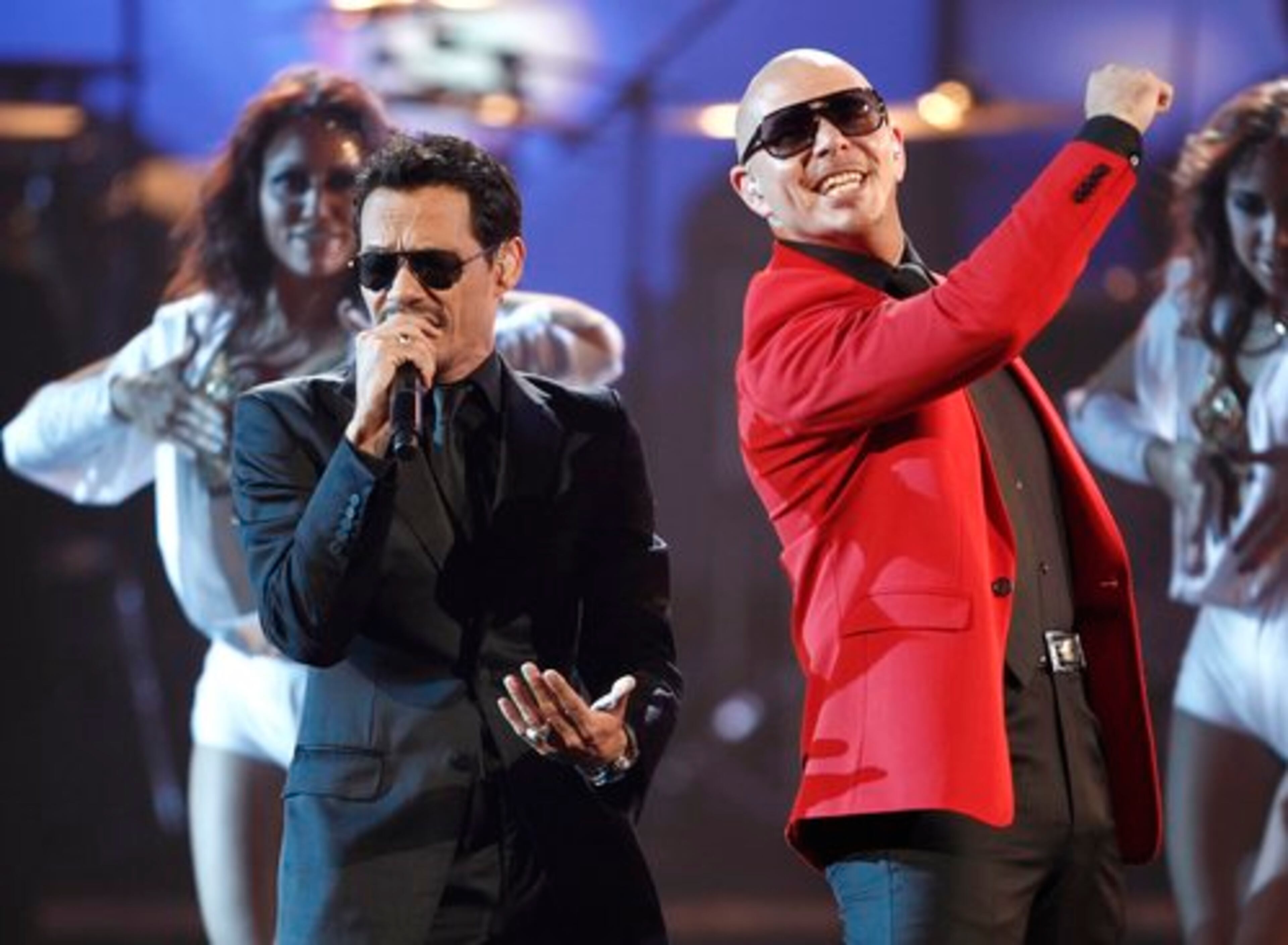 Marc Anthony (left) and Pitbull brought some Latin flavor to the show, performing "Rain Over Me"
