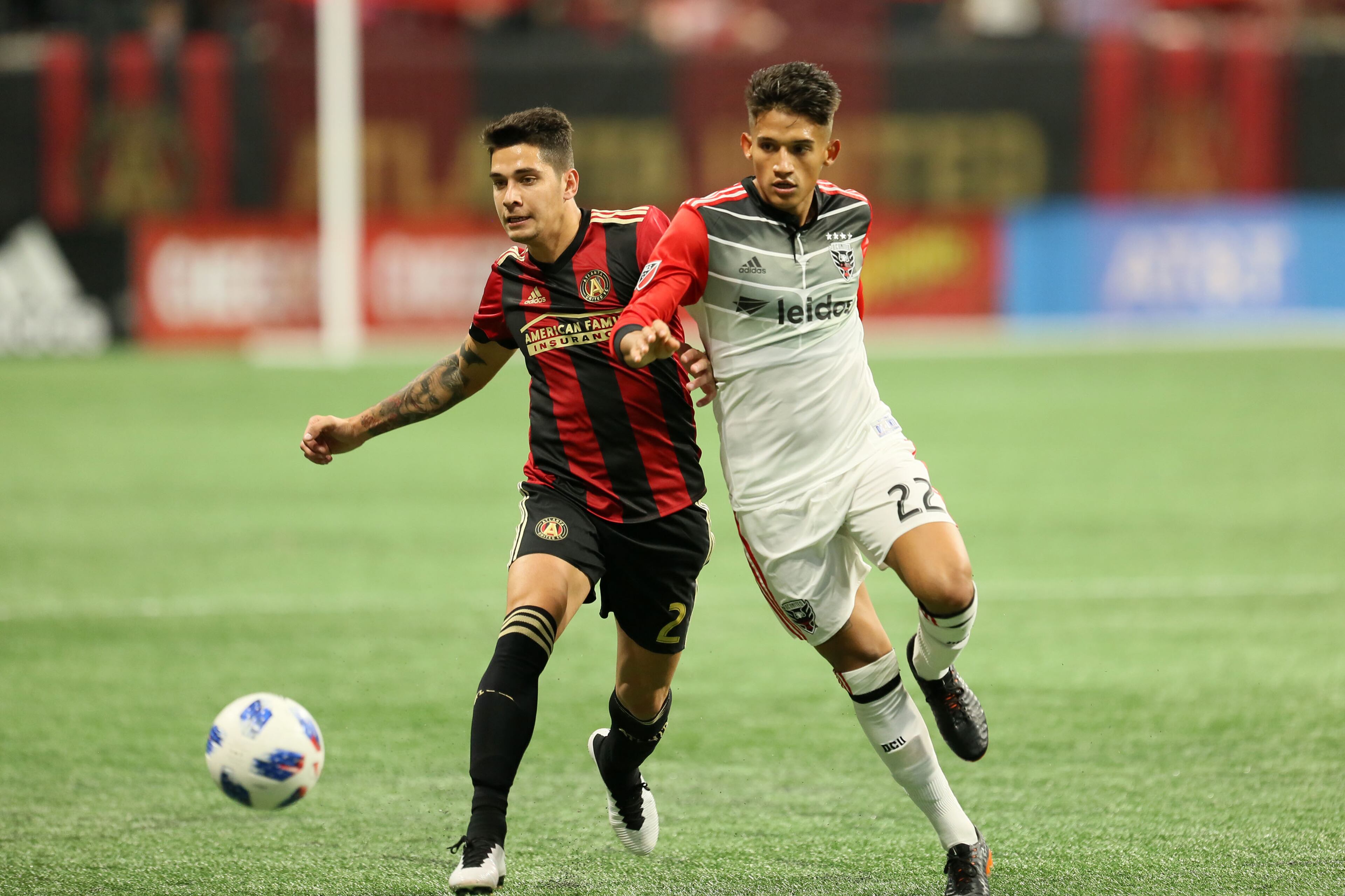 March 11, 2018. Former Atlanta United forward Yamil Asad disputes a ball against Atlanta United defender Franco Escobar on March 11, 2018 in Atlanta Ga..