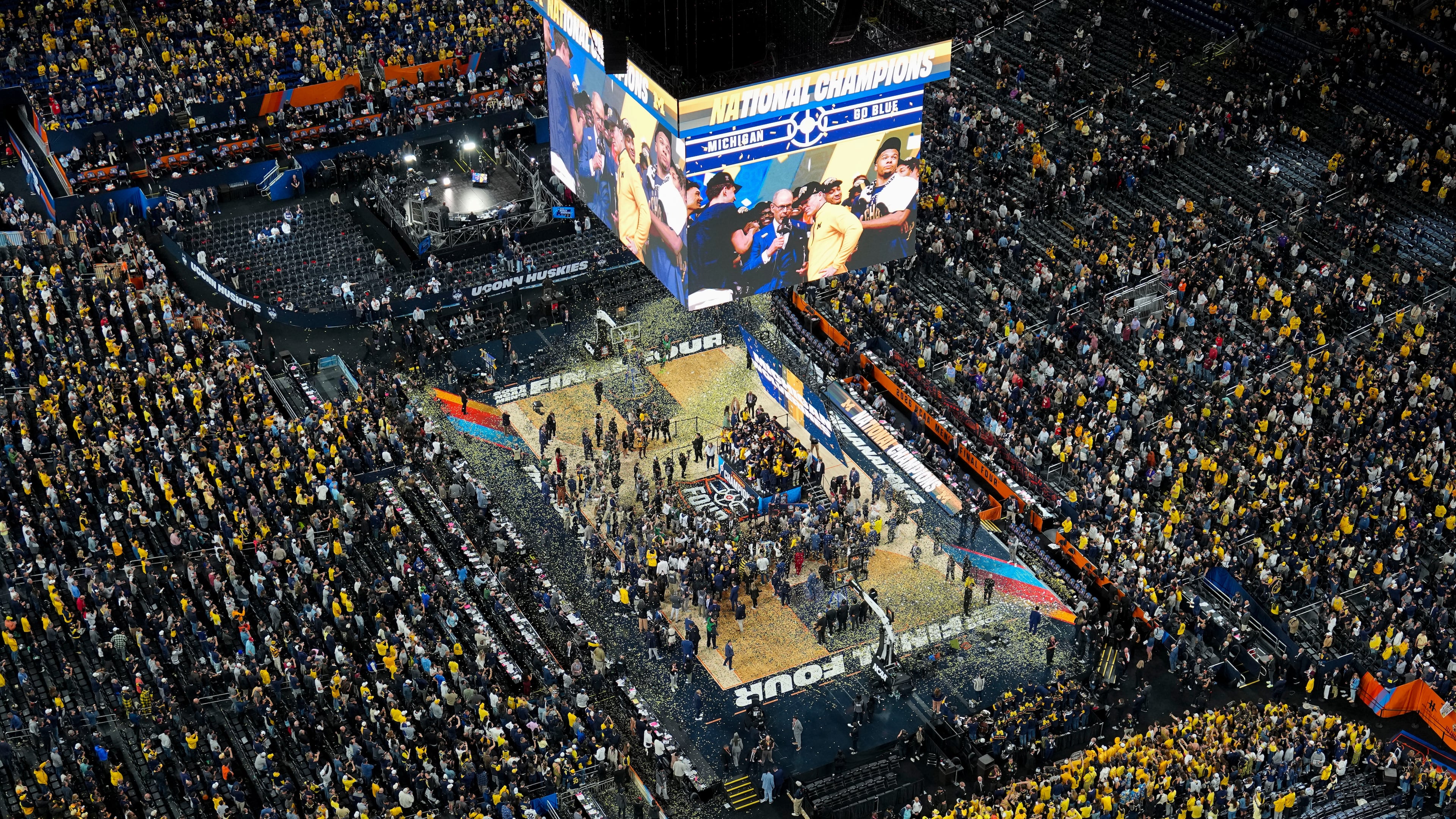 Michigan celebrates after defeating UConn in the NCAA college basketball tournament national championship game at the Final Four, Monday, April 6, 2026, in Indianapolis. (AP Photo/AJ Mast)