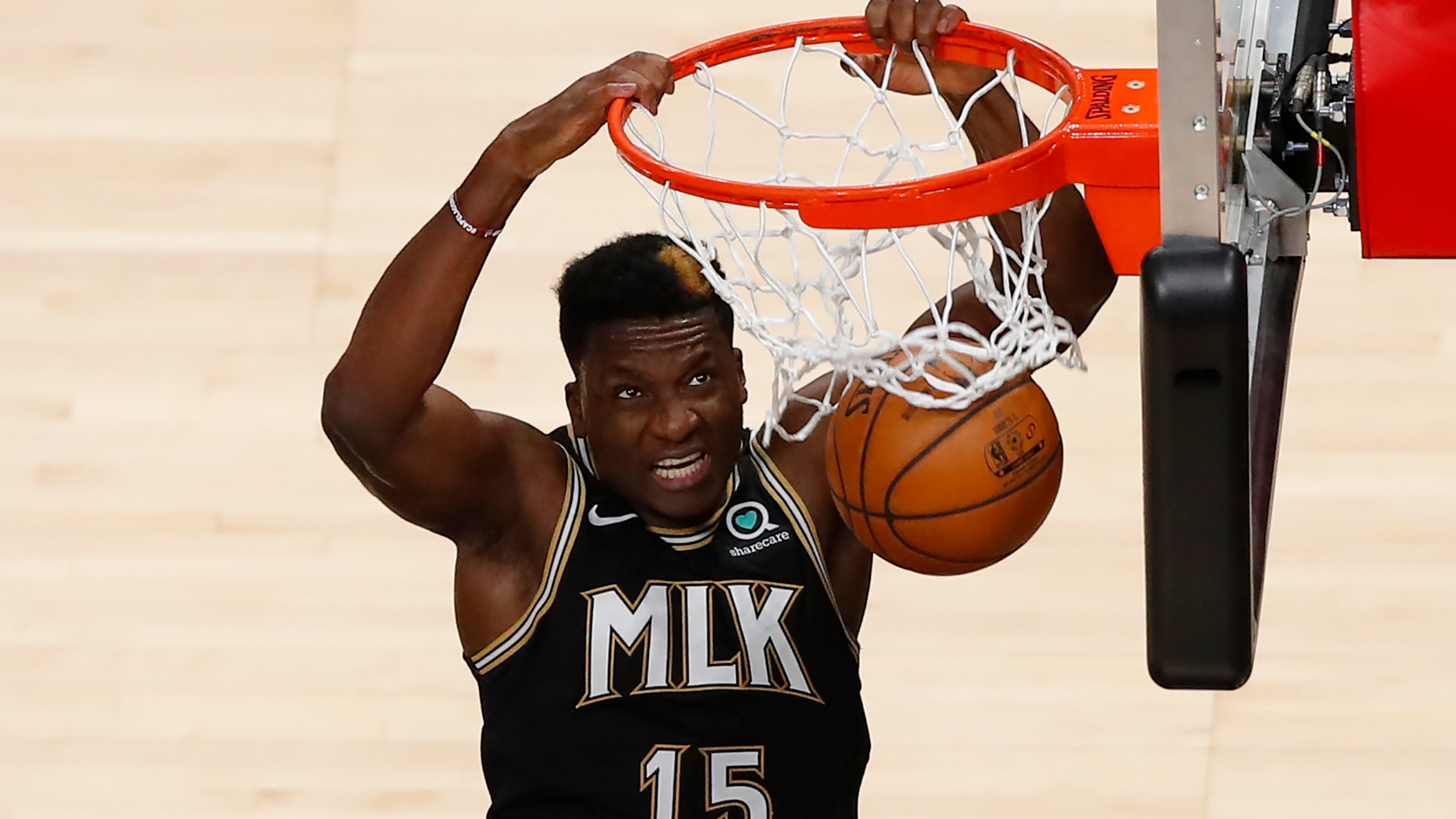 Atlanta Hawks center Clint Capela dunks during the second half of the team's NBA basketball game against the Toronto Raptors on Saturday, Feb. 6, 2021, in Atlanta. (AP Photo/Todd Kirkland)