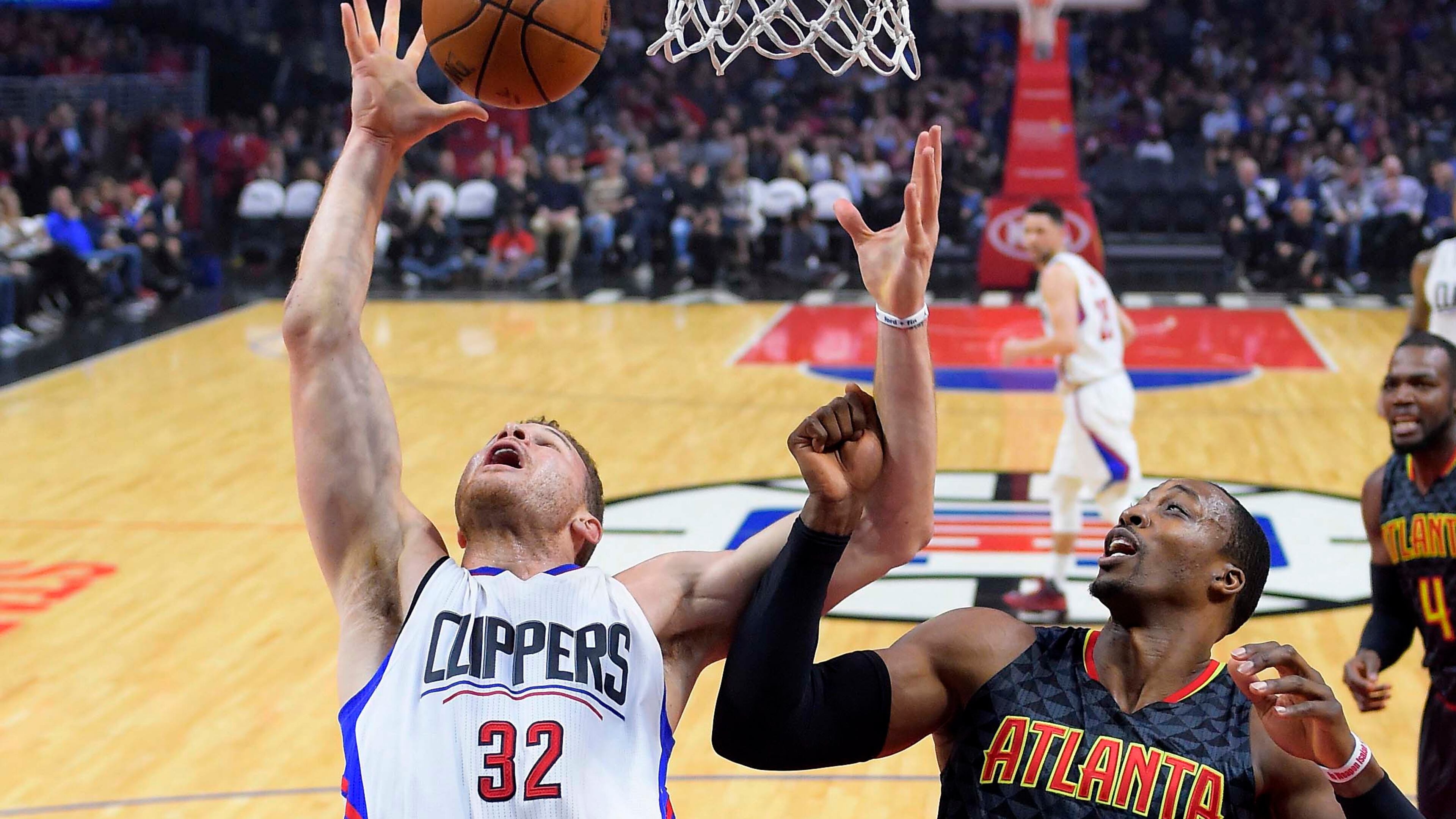 Los Angeles Clippers forward Blake Griffin, left, and Atlanta Hawks center Dwight Howard reach for a rebound during the first half of an NBA basketball game, Wednesday, Feb. 15, 2017, in Los Angeles. (AP Photo/Mark J. Terrill)