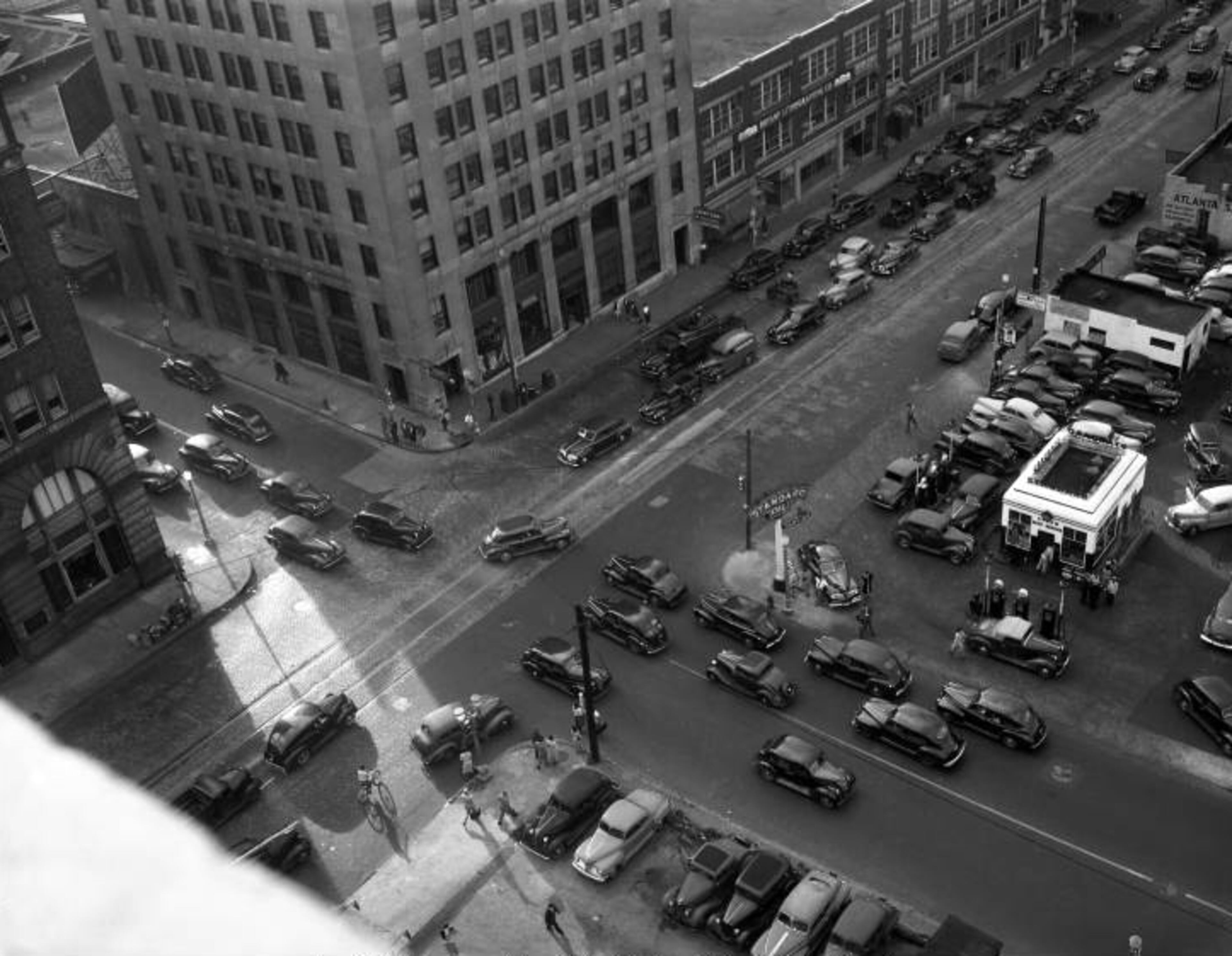 An unidentified intersection in downtown Atlanta. The photo's info only provides this: Traffic and parking lots in downtown Atlanta, 1945.