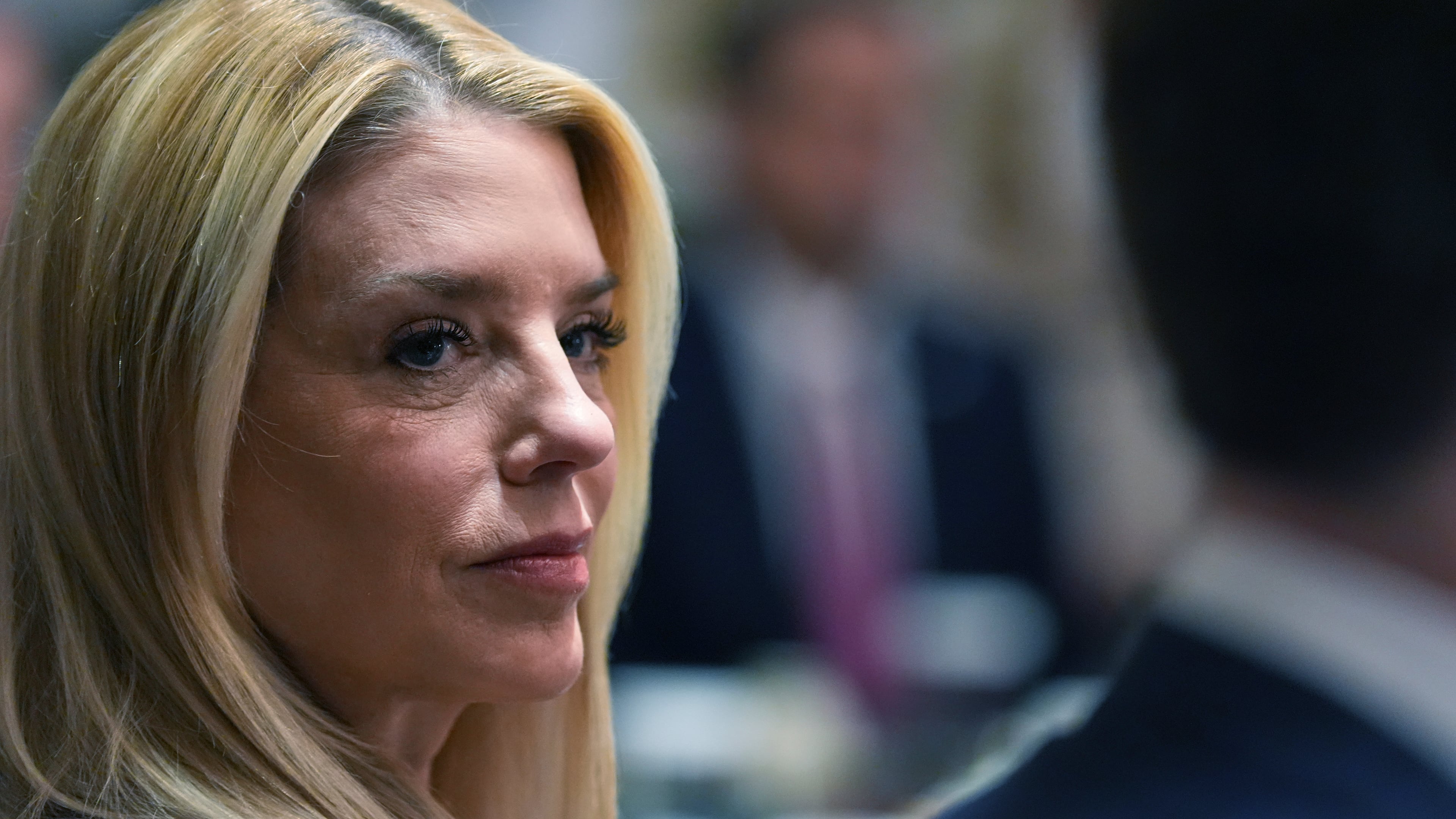 Attorney General Pam Bondi listens during a Cabinet meeting at the White House, Thursday, March 26, 2026, in Washington. (AP Photo/Alex Brandon)