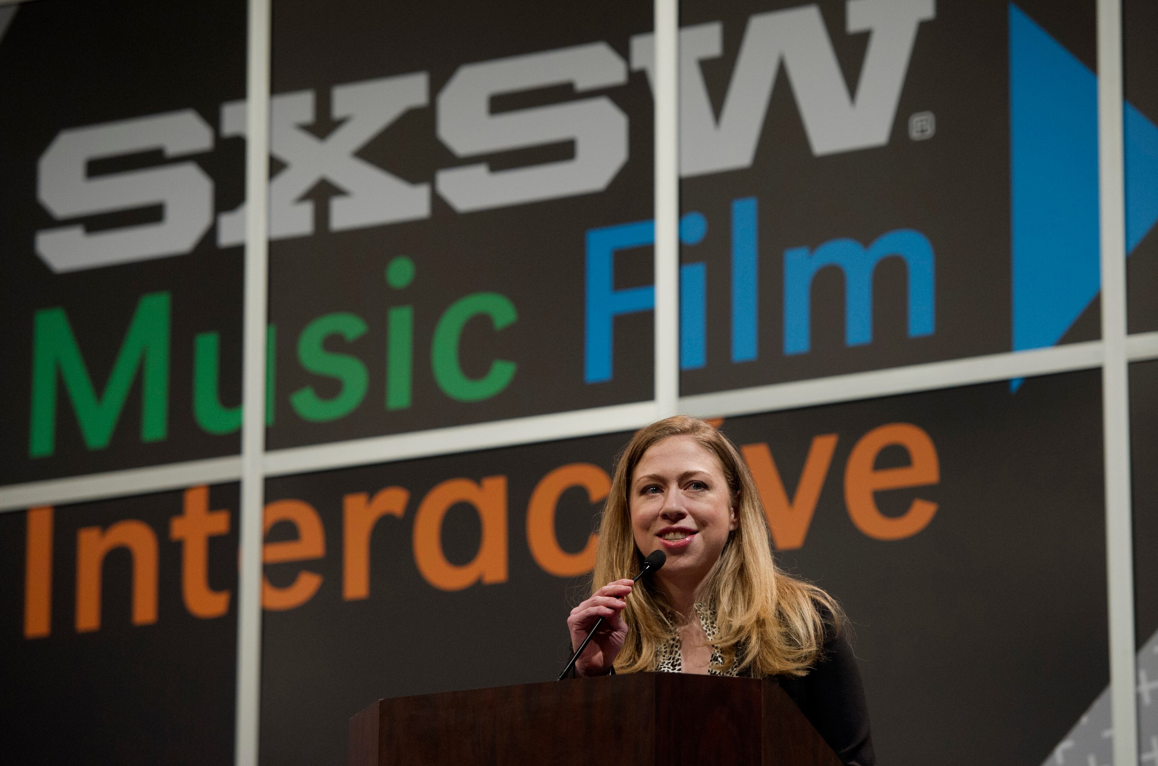 Chelsea Clinton, daughter of former U.S. President Bill Clinton, speaks during a keynote address at the South By Southwest (SXSW) Interactive Festival in Austin, Texas, U.S., on Tuesday, March 11, 2014. The SXSW conferences and festivals converge original music, independent films, and emerging technologies while fostering creative and professional growth. Photographer: David Paul Morris/Bloomberg *** Local Caption *** Chelsea Clinton