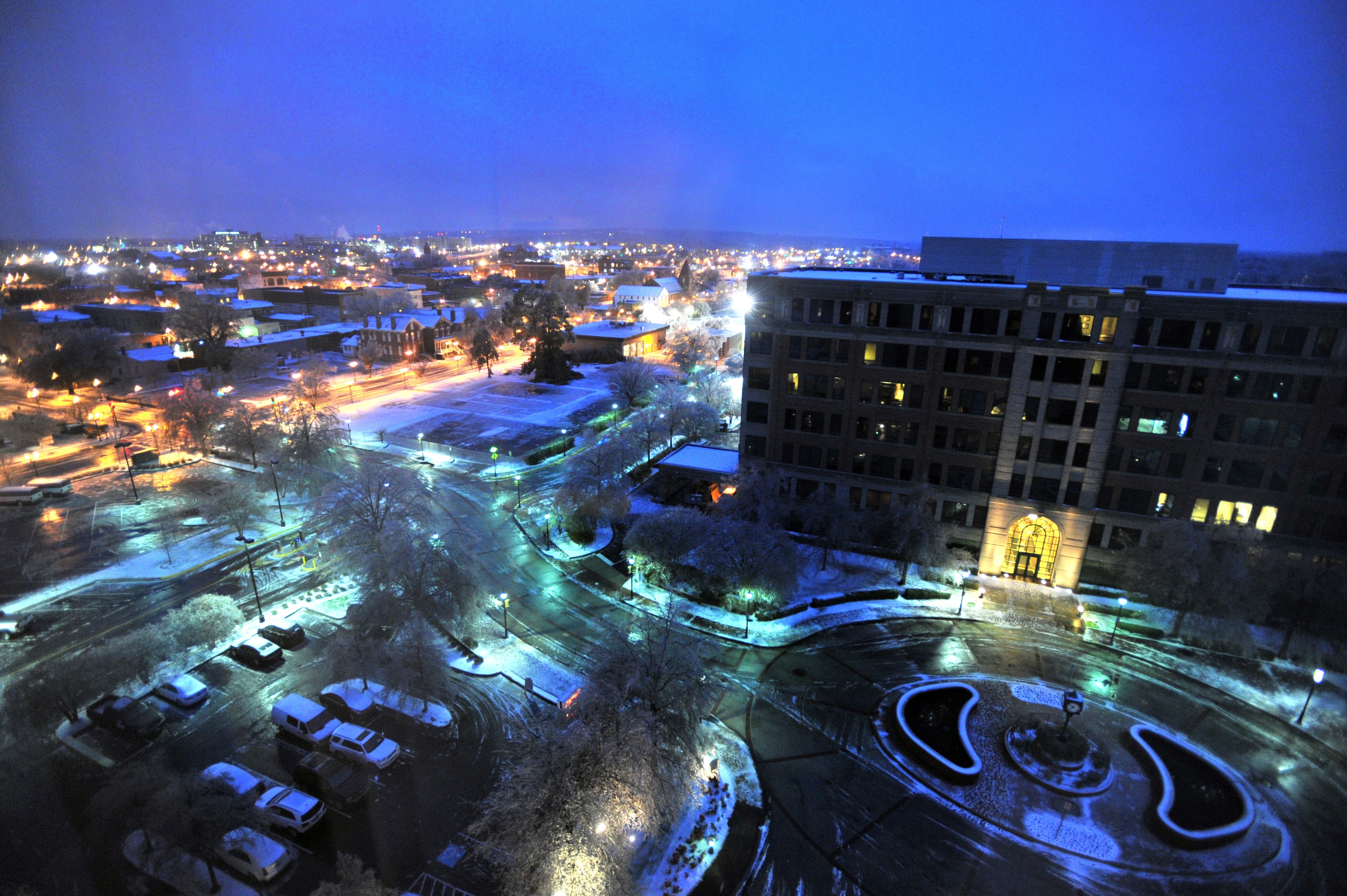Downtown Augusta looks nearly empty early Thursday morning after a winter storm hit and knocked out power. Georgia Power set up a massive staging area for utility trucks - many of them supplied by out-of-state contractors - in the parking lot of the defunct Regency Mall south of downtown Augusta. HYOSUB SHIN / HSHIN@AJC.COM