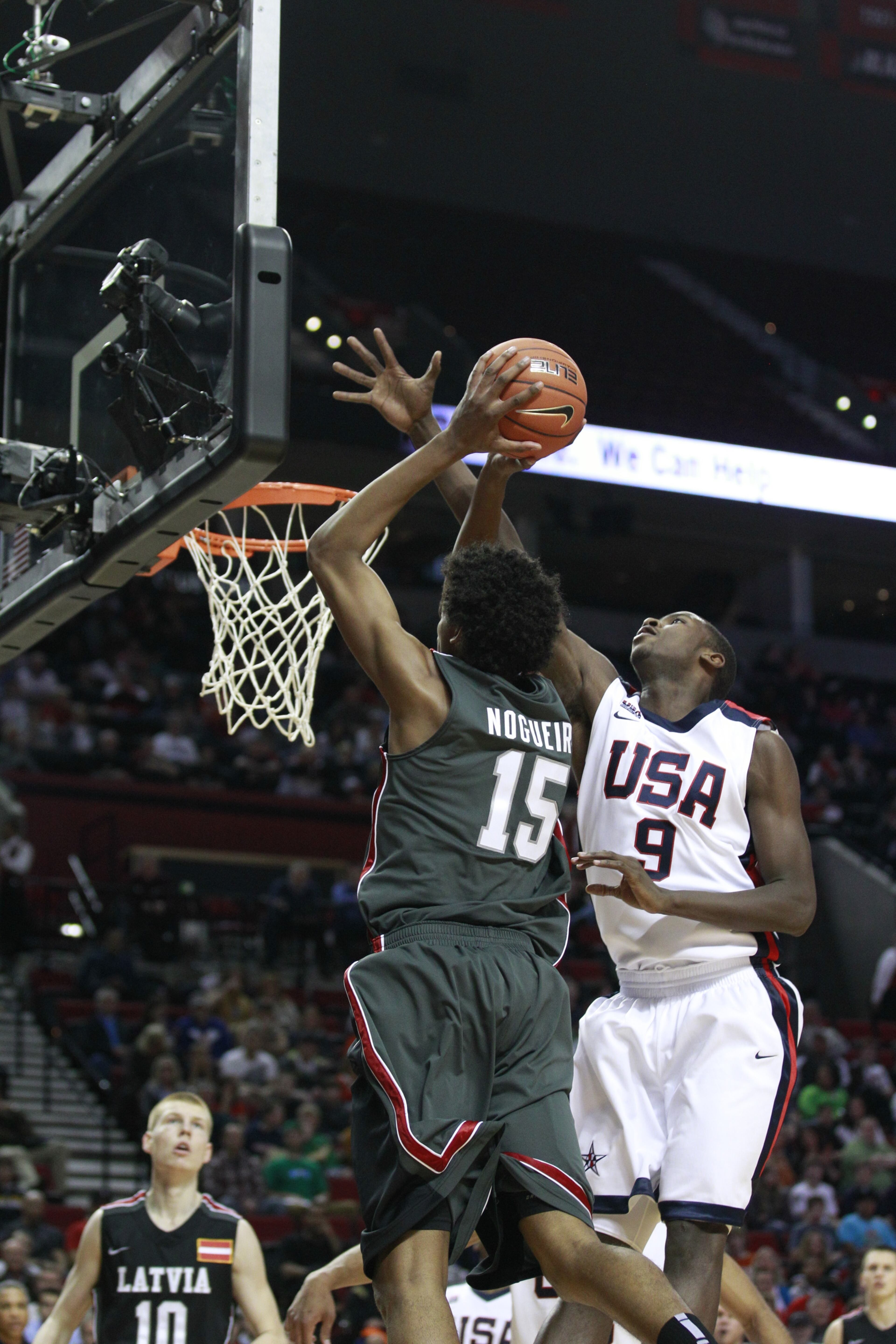 U.S. Junior National Team's Michael Gilchrist (9), of Somerdale, N.J., blocks the shot of Lucas Riva Nogueira (15), of Brazil, in the Nike Hoop Summit on April 9, 2011, in Portland, Ore.