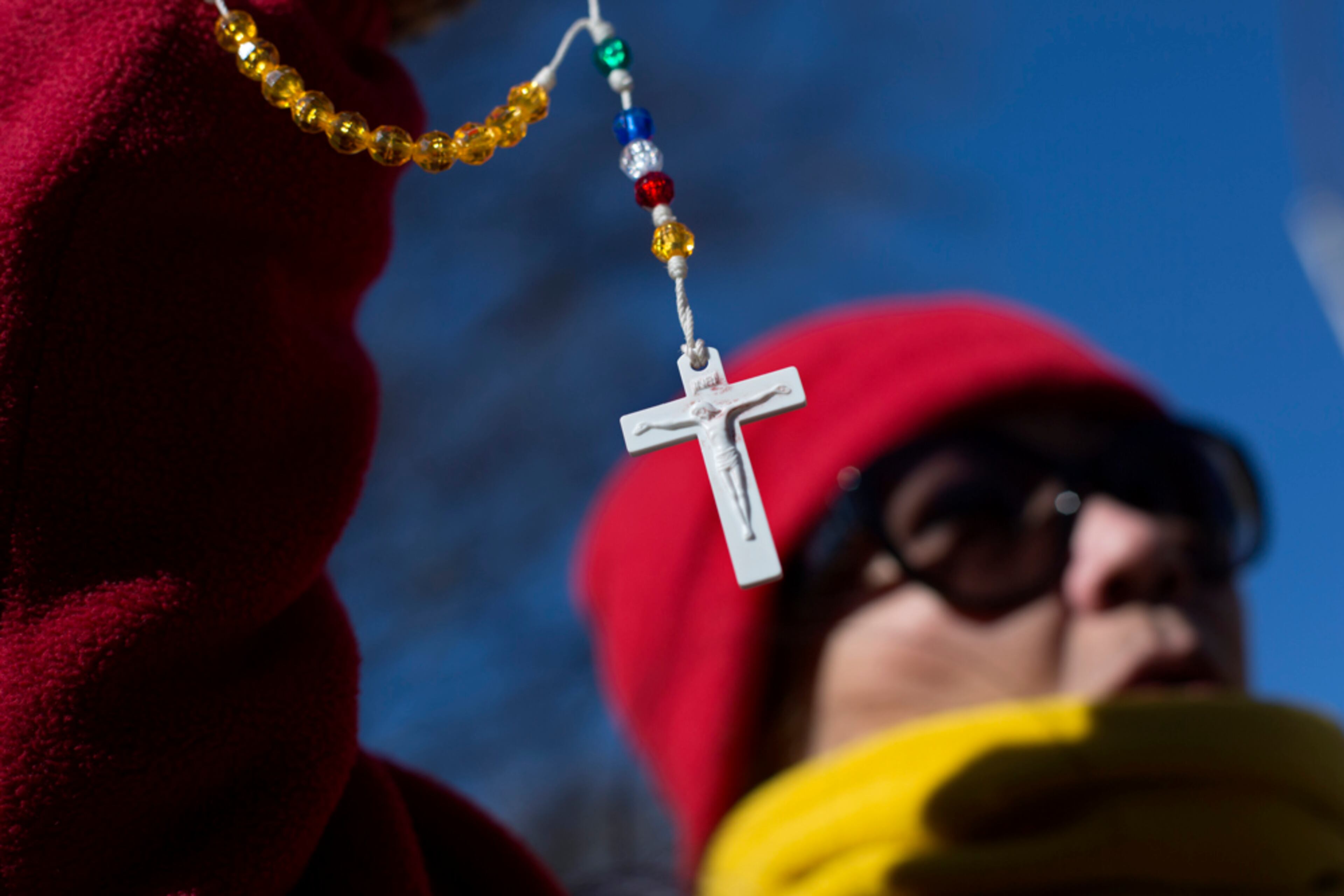 GEORGIA ABORTION ANNIVERSARY--Elizabeth Antillon, of Conyers, Ga., holds a cross while demonstrating during the March For Life anti-abortion rally outside the State Capitol, Wednesday, Jan. 22, 2014, in Atlanta. Hundreds of anti-abortion demonstrators gathered outside the Statehouse for the annual rally to protest the Supreme Court's landmark 1973 decision that declared a constitutional right to abortion. (AP Photo/David Goldman)
