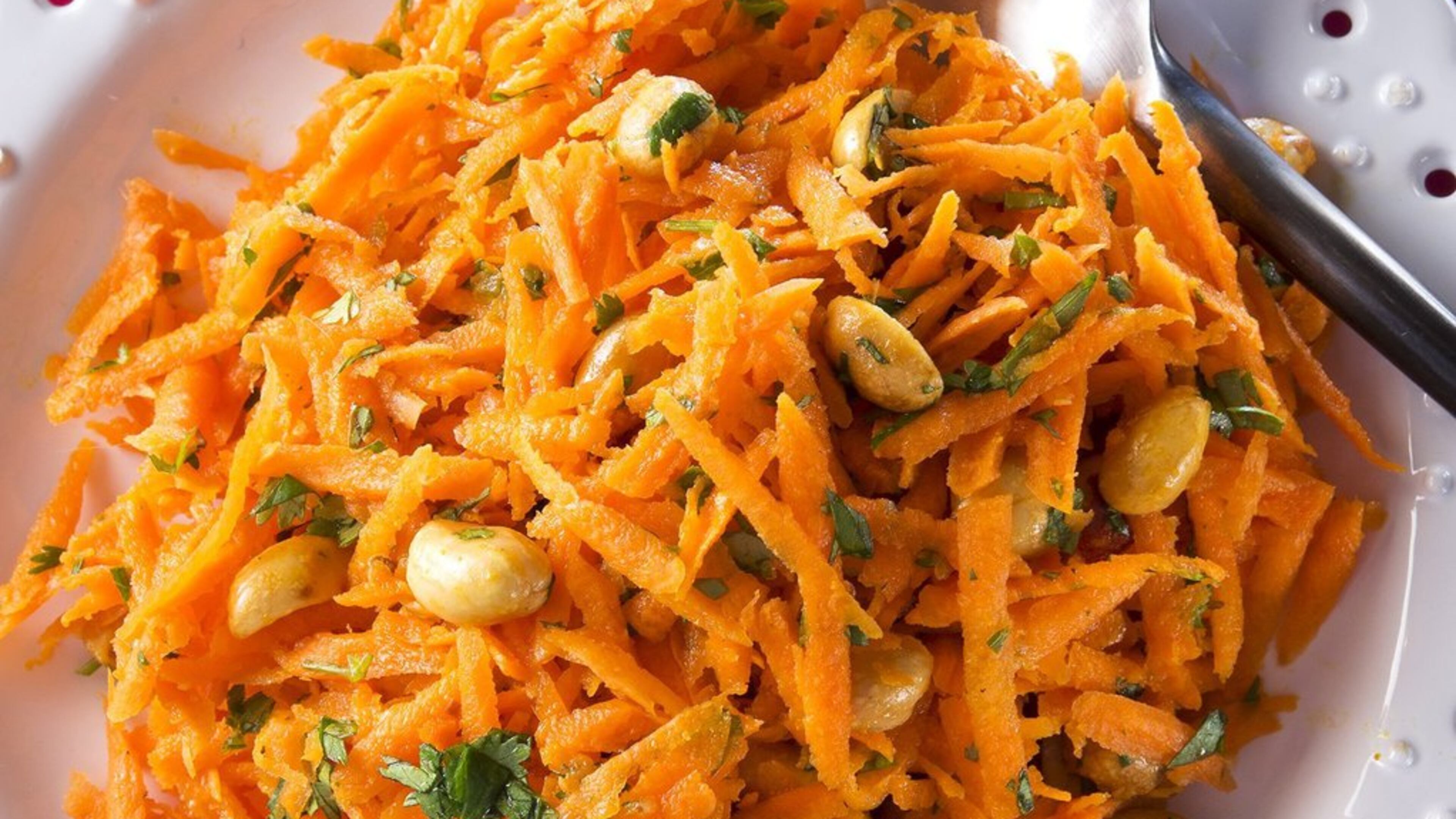 Cilantro Carrot Salad gets a super-spice boost from turmeric, which has anti-inflammatory properties. (Tammy Ljungblad/Kansas City Star/TNS)