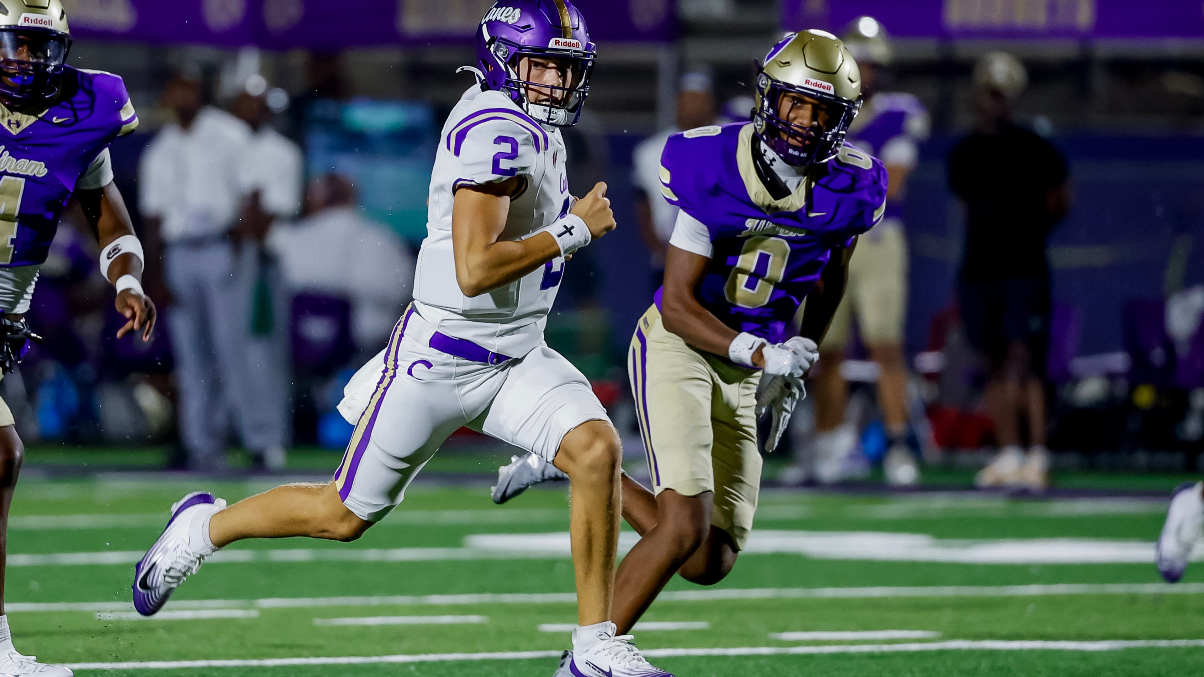 Cartersville quarterback Brody Jones runs against Hiram's Kendall Robinson during the second half of a high school football game between Hiram and Cartersville, Friday, Aug. 21, 2026, in Hiram, GA. (Erik S. Lesser for the AJC)