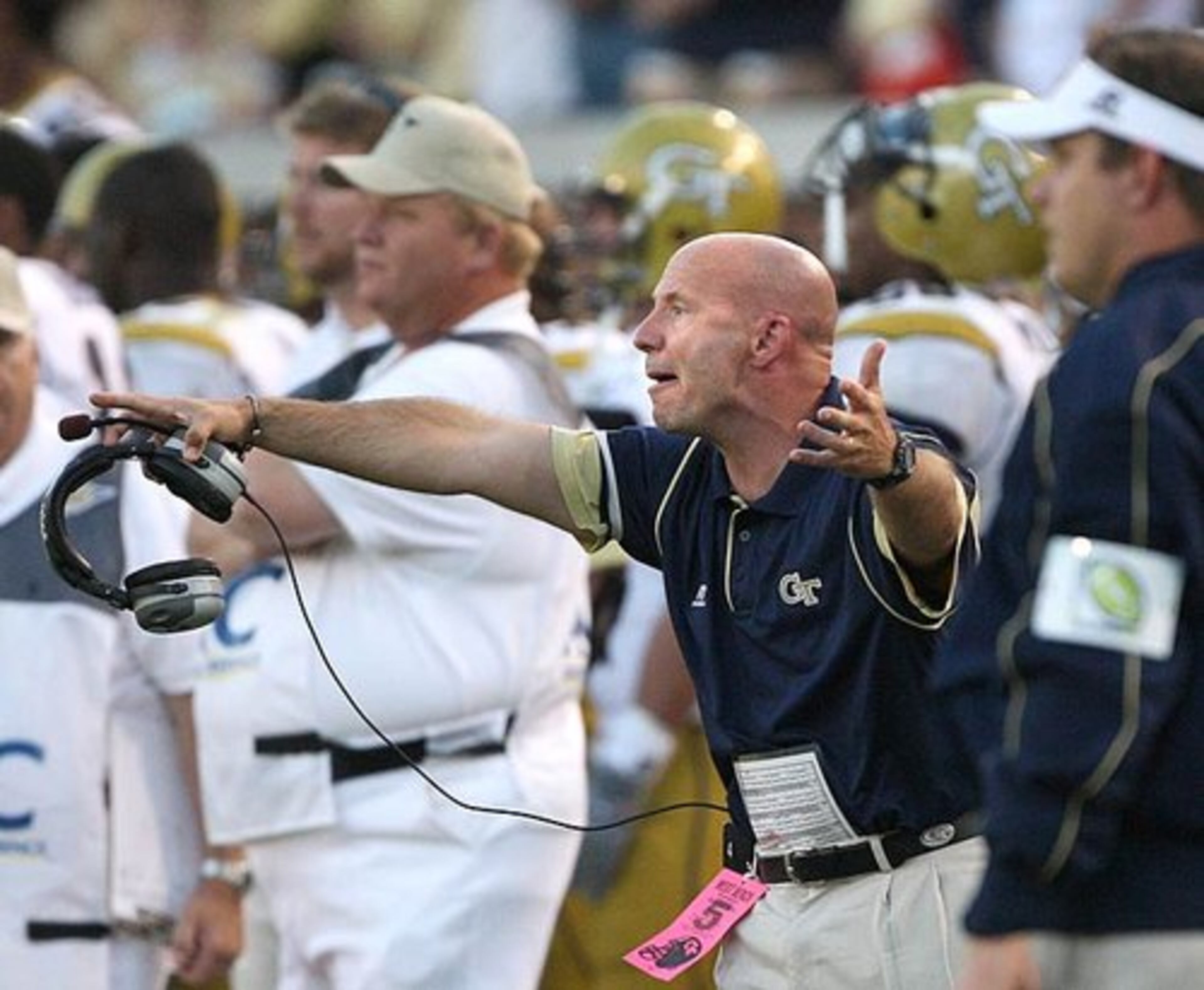 Georgia Tech's defensive backs coach Charles Kelly complains to the officials on what he thought was pass interference against Demaryius Thomas in the final seconds of the game.