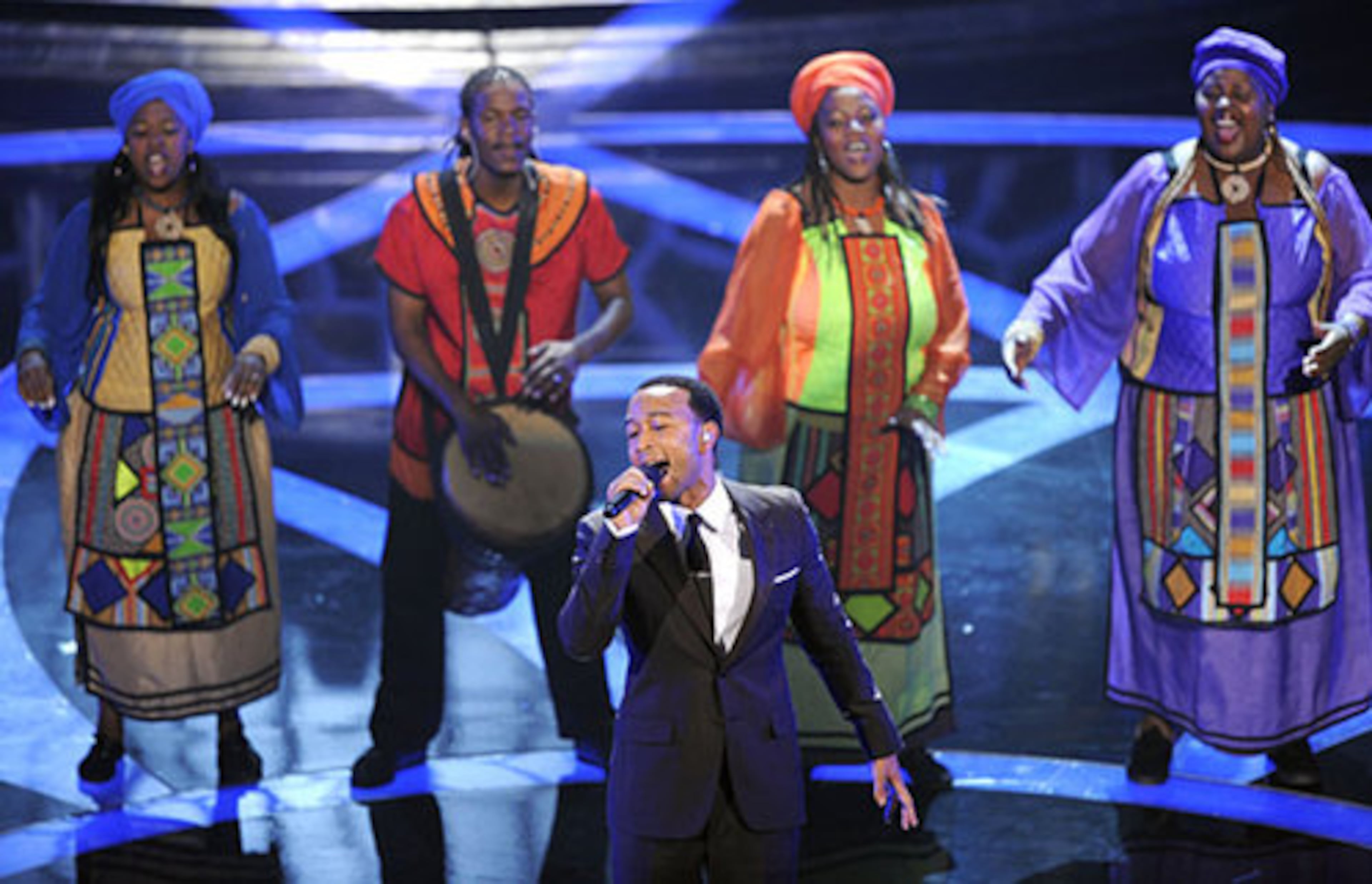 Singer John Legend performs with the Soweto Gospel Choir the Oscar-nominated best original song "Down to Earth" from the motion picture "WALL-E."