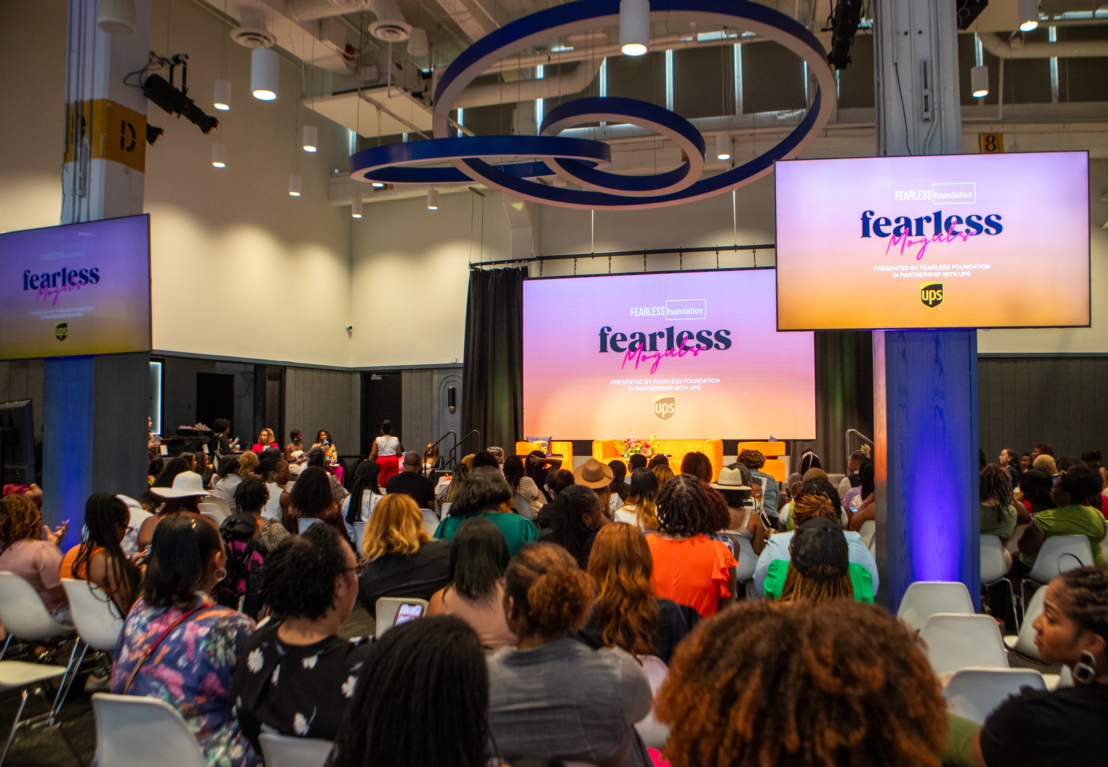 Attendees network during a break at the Fearless Moguls Summit held at The Gathering Spot ATL on Friday, Aug 30, 2024, for women of color entrepreneurs. (Jenni Girtman for the AJC)