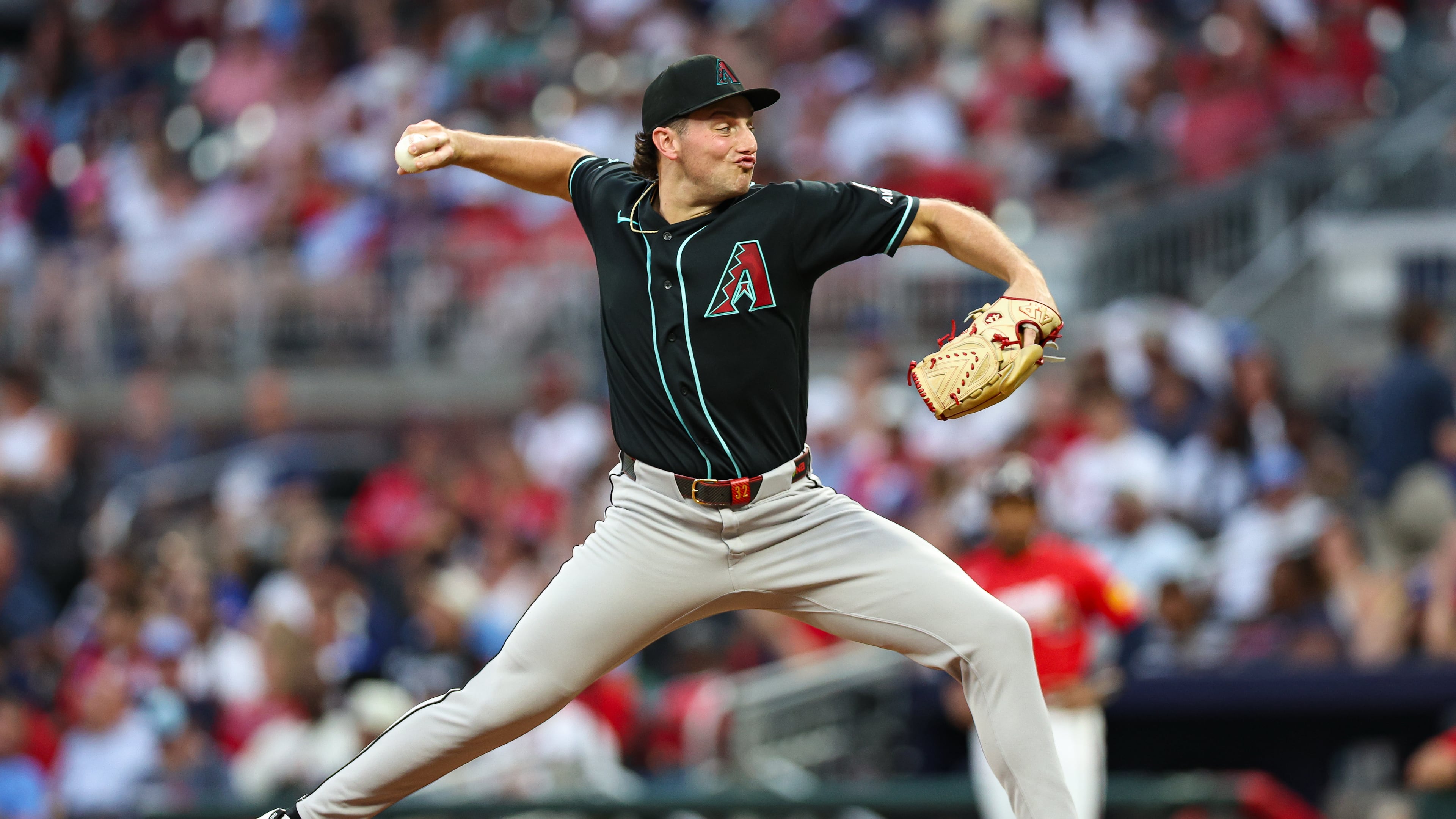 Arizona Diamondbacks pitcher Brandon Pfaadt delivers in the third inning of a baseball game against the Atlanta Braves, Friday, Aug. 14, 2026, in Atlanta. (AP Photo/Colin Hubbard)