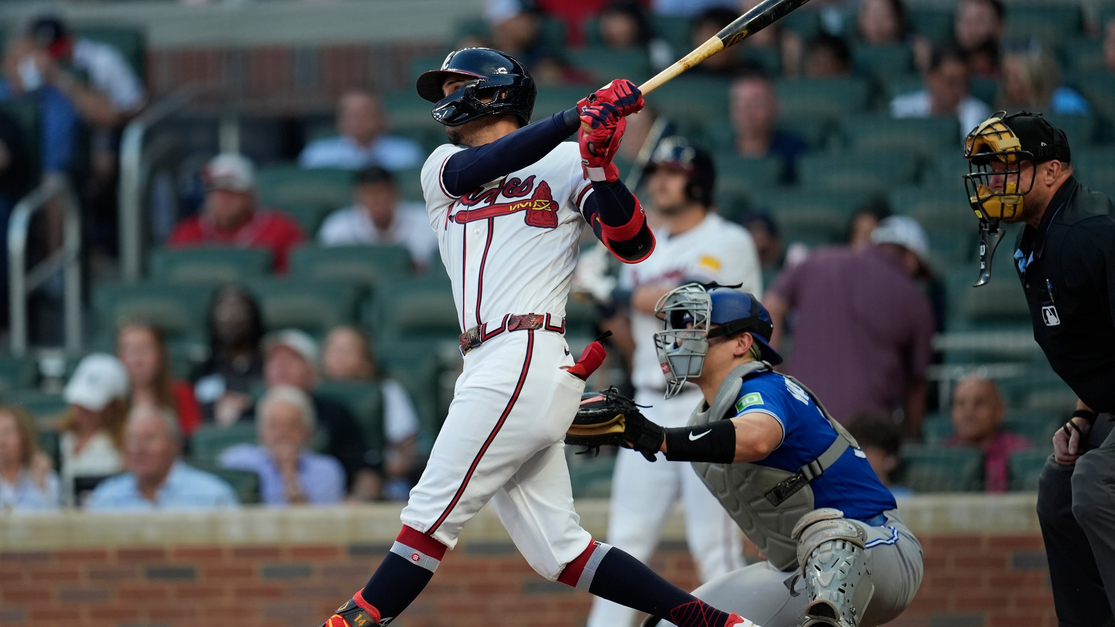 Atlanta Braves' Mauricio Dubón hits a three-run homer in the third inning of a baseball game against the Toronto Blue Jays, Wednesday, June 3, 2026, in Atlanta. (AP Photo/Mike Stewart)