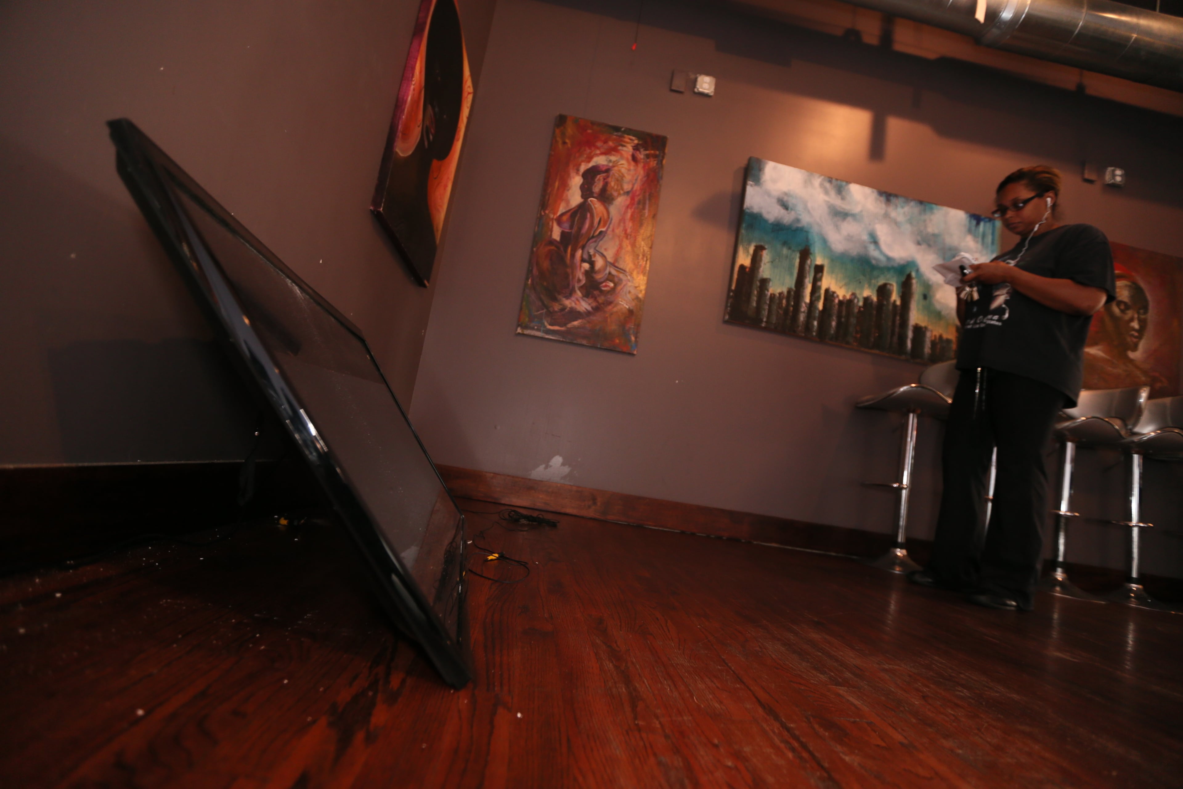 Bobbie Robinson and her business partner opened Harold’s Chicken & Ice Bar on Edgewood Avenue one year ago this month. Since then, the Sweet Auburn Historic District restaurant and sports bar, which fronts the new Atlanta Streetcar line slated to open in 2014, has been broken into three times. JOHN SPINK/JSPINK@AJC.COM