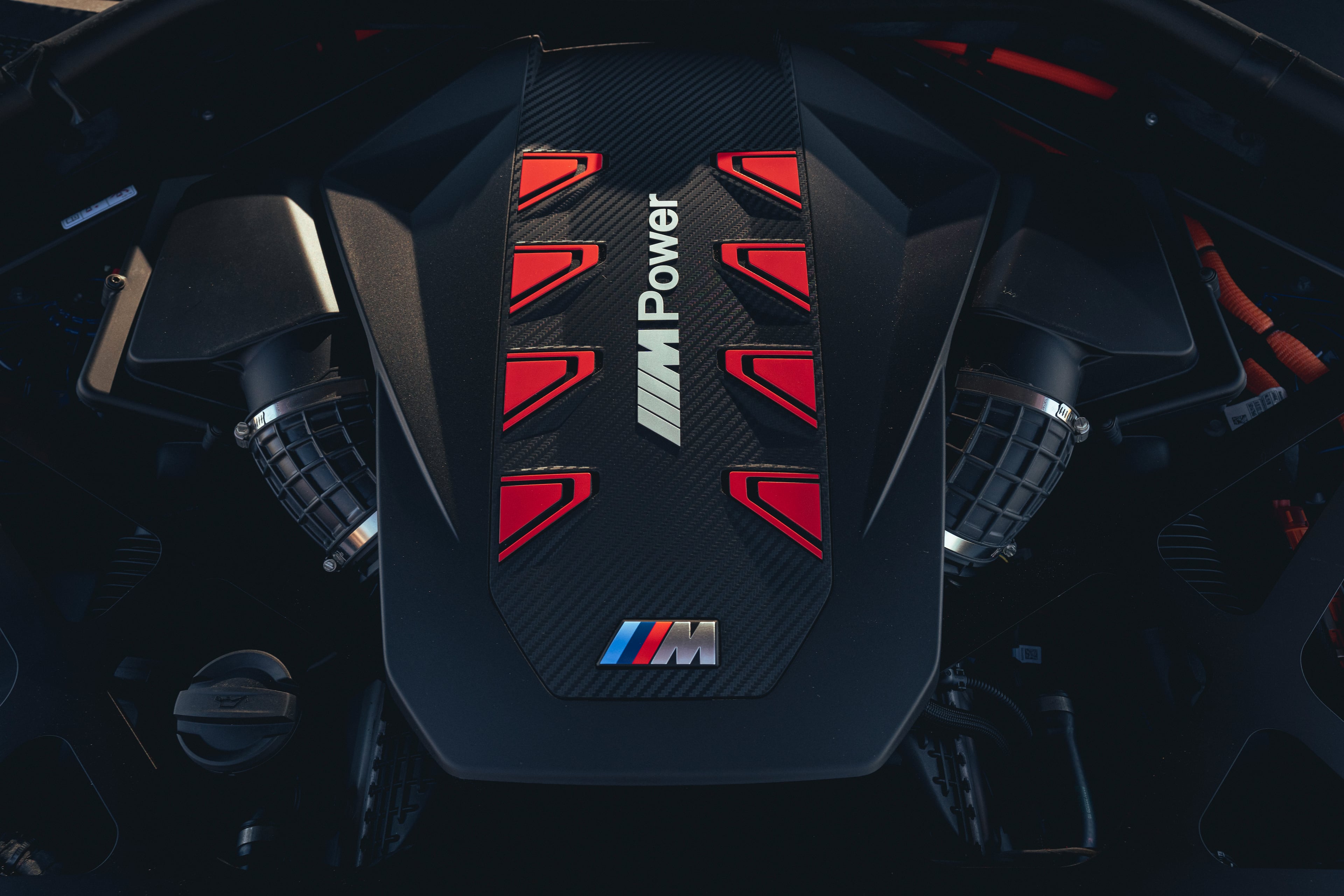 In the BMW XM, once the 31 miles of electric range runs out, the twin-turbo 4.4-liter V-8 engine roars to life. (Courtesy of BMW)