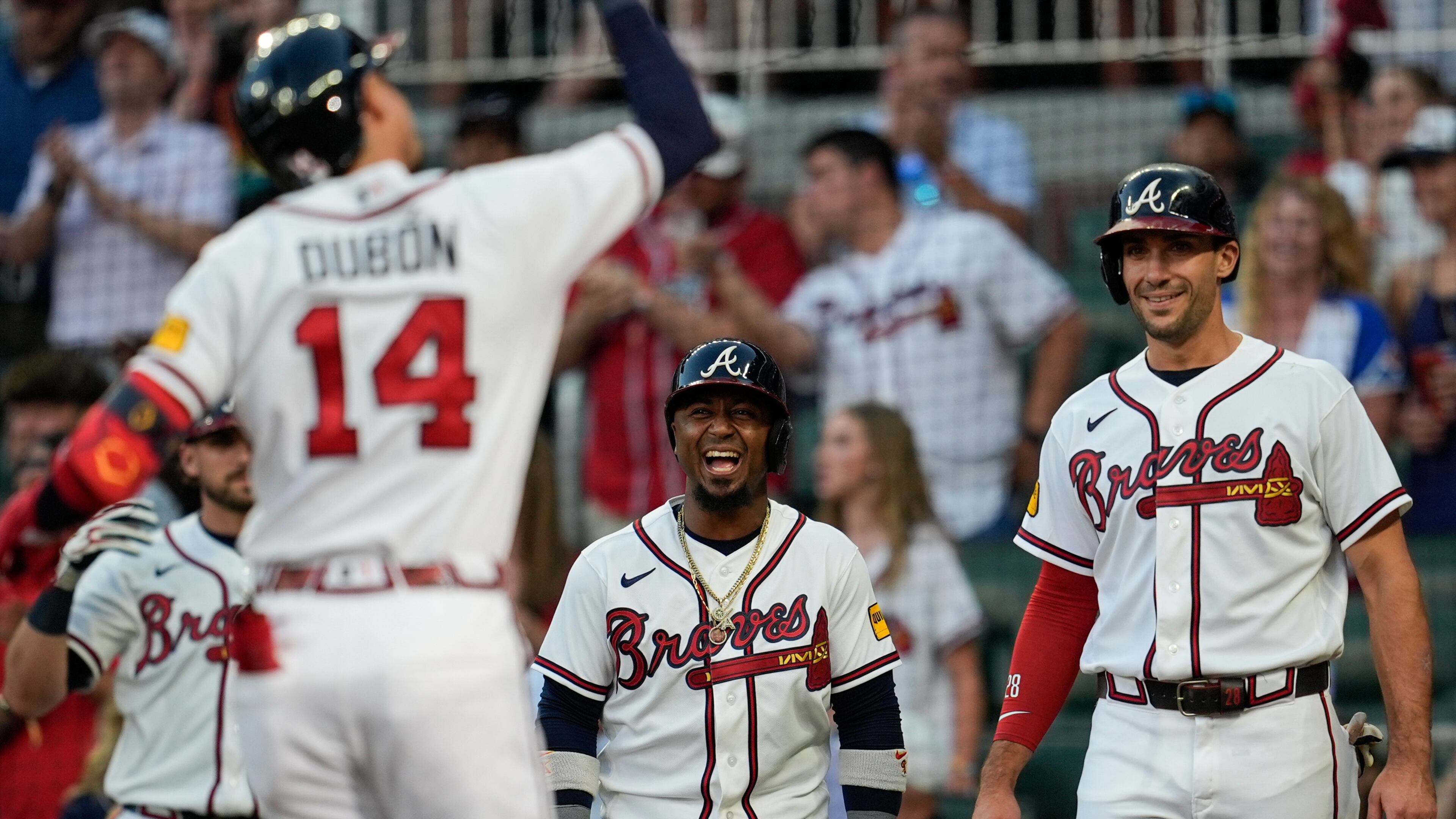 Atlanta Braves' Mauricio Dubón celebrates with teammates after hitting a three-run homer in the third inning of a baseball game against the Toronto Blue Jays, Wednesday, June 3, 2026, in Atlanta. (AP Photo/Mike Stewart)