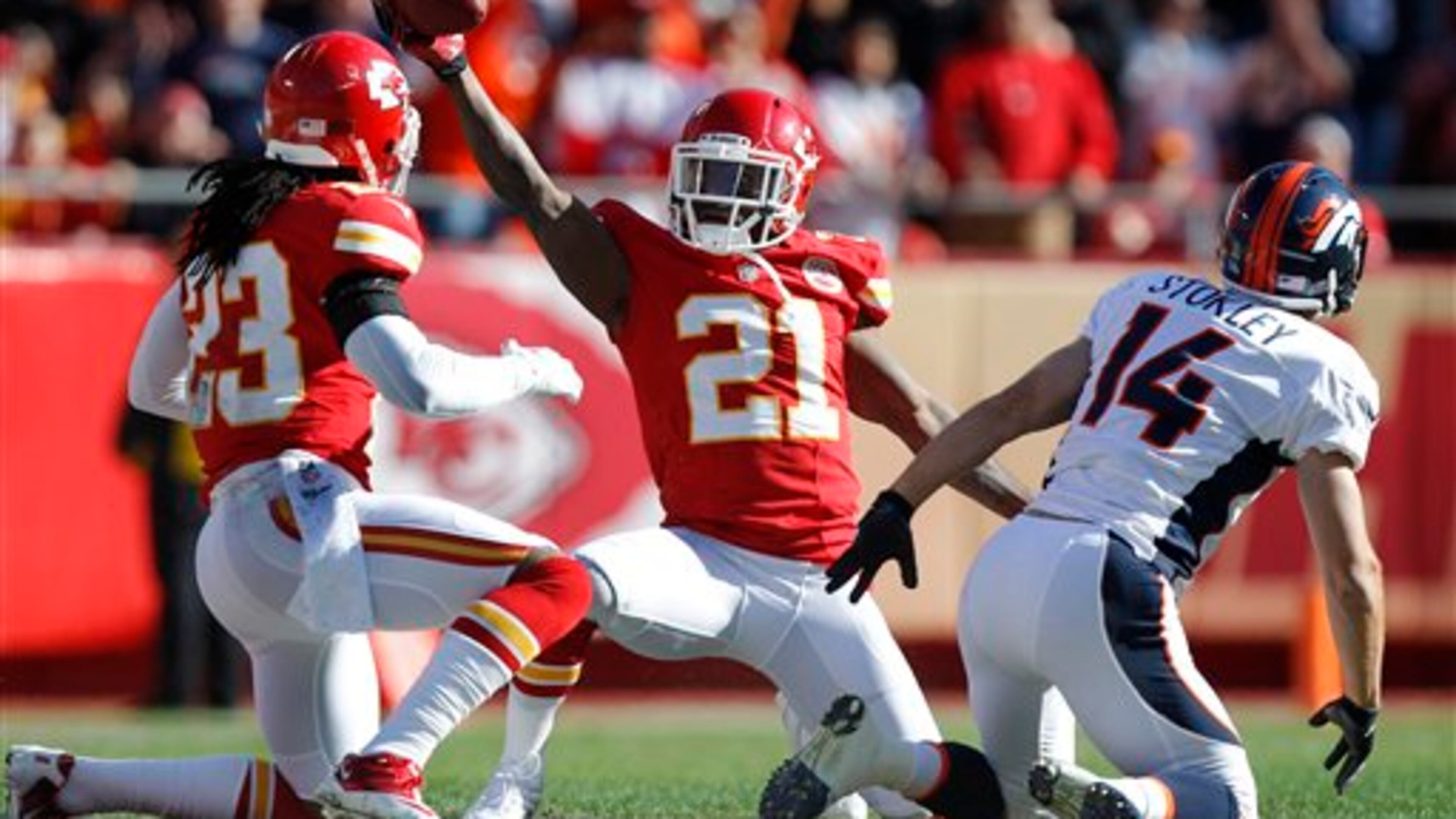 Kansas City Chiefs cornerback Javier Arenas (21) comes up with the ball after intercepting a pass intended for Denver Broncos wide receiver Brandon Stokley (14) during the first half of an NFL football game at Arrowhead Stadium in Kansas City, Mo., Sunday, Nov. 25, 2012. Chiefs free safety Kendrick Lewis (23) was in on the play. (AP Photo/Ed Zurga) Kansas City Chiefs cornerback Javier Arenas (21) comes up with the ball after intercepting a pass intended for Denver Broncos wide receiver Brandon Stokley (14) during the first half of an NFL football game at Arrowhead Stadium in Kansas City, Mo., Sunday, Nov. 25, 2012. Chiefs free safety Kendrick Lewis (23) was in on the play. (AP Photo/Ed Zurga)