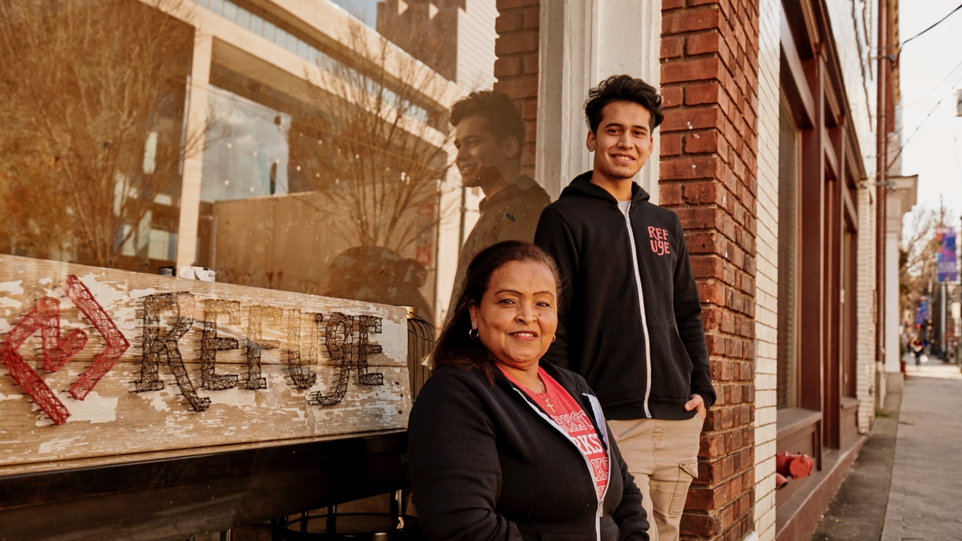 Refuge Coffee Co. employees outside the nonprofit's new location on Auburn Avenue.
