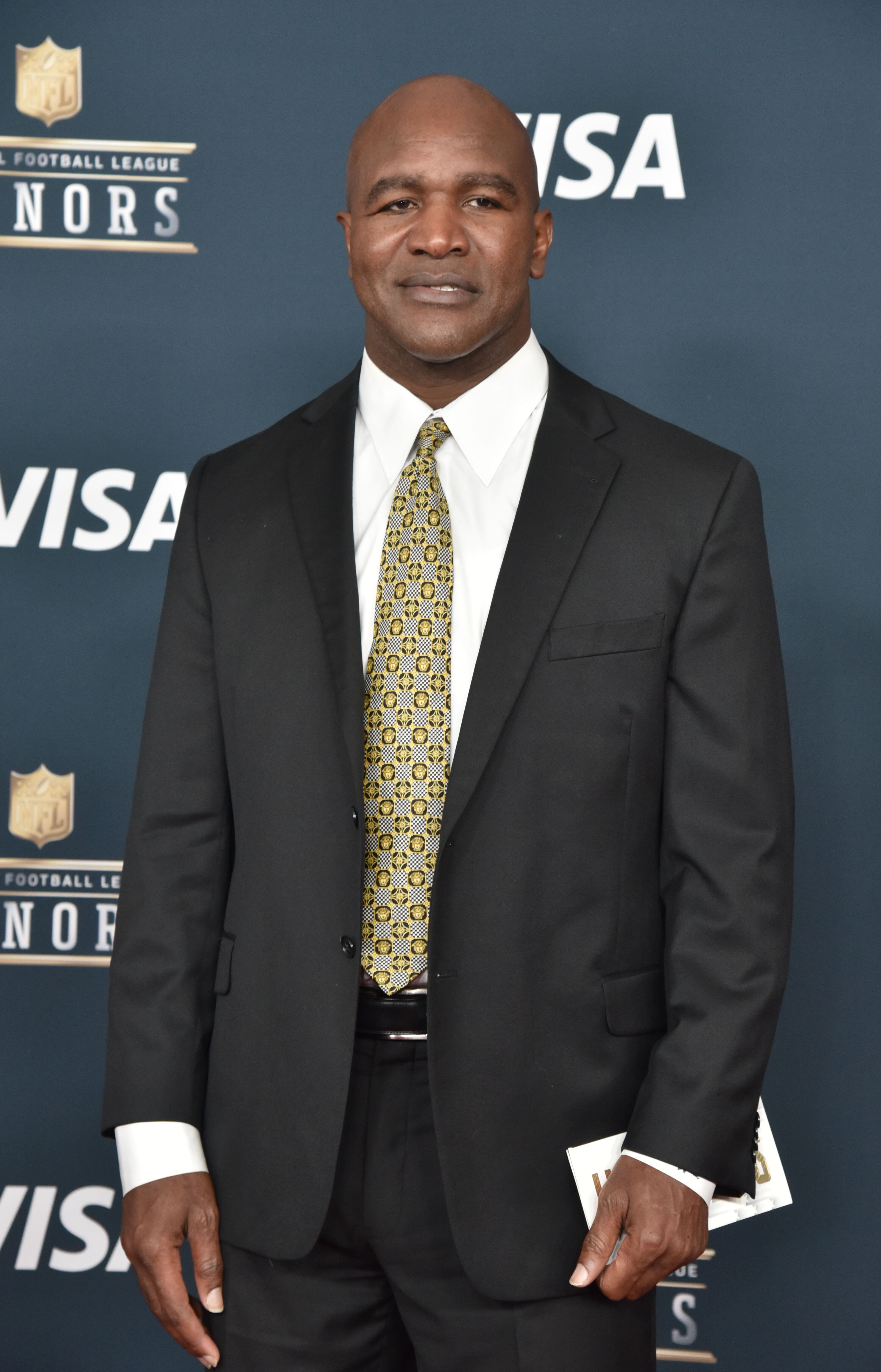 February 4, 2017 Houston, TX - Professional boxer Evander Holyfield poses for photographers on the red carpet before the annual NFL Honors awards show at Wortham Theater Center in Houston, TX, on Saturday, February 4, 2017. HYOSUB SHIN / HSHIN@AJC.COM