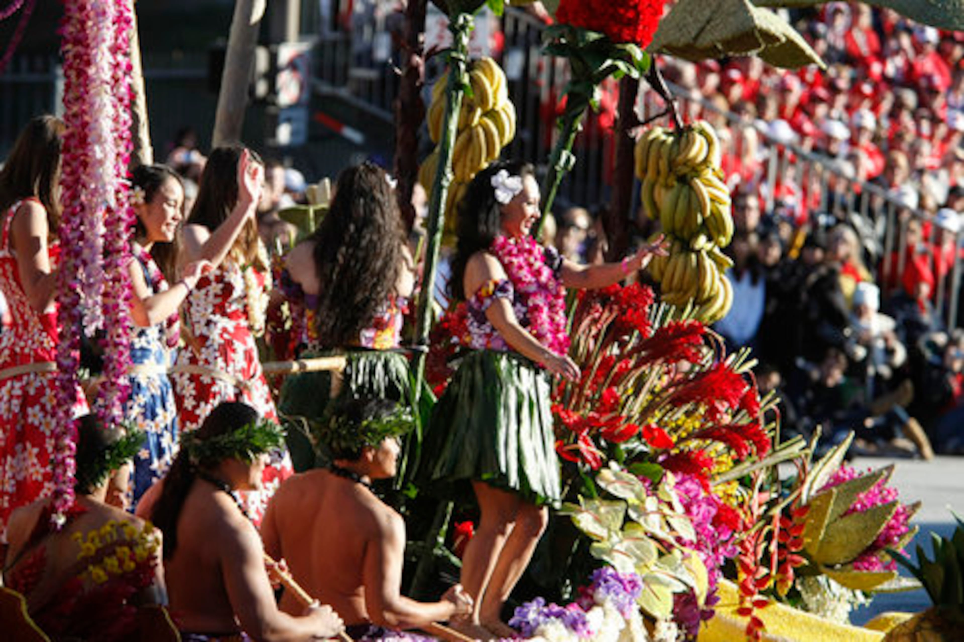 The Dole "Living Well in Paradise" float featured dancers and fresh fruit.
