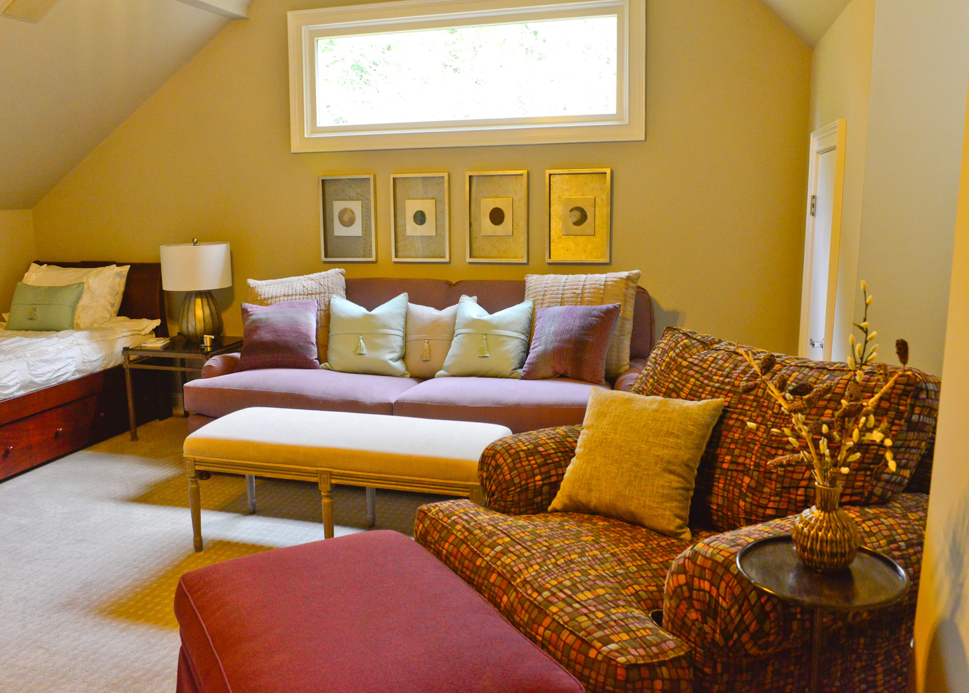 Sabrina Dobbs has had most of this furniture for years. The daybed, for example, used to be in her son's room. The agate stone art above the sofa came from Uttermost.
