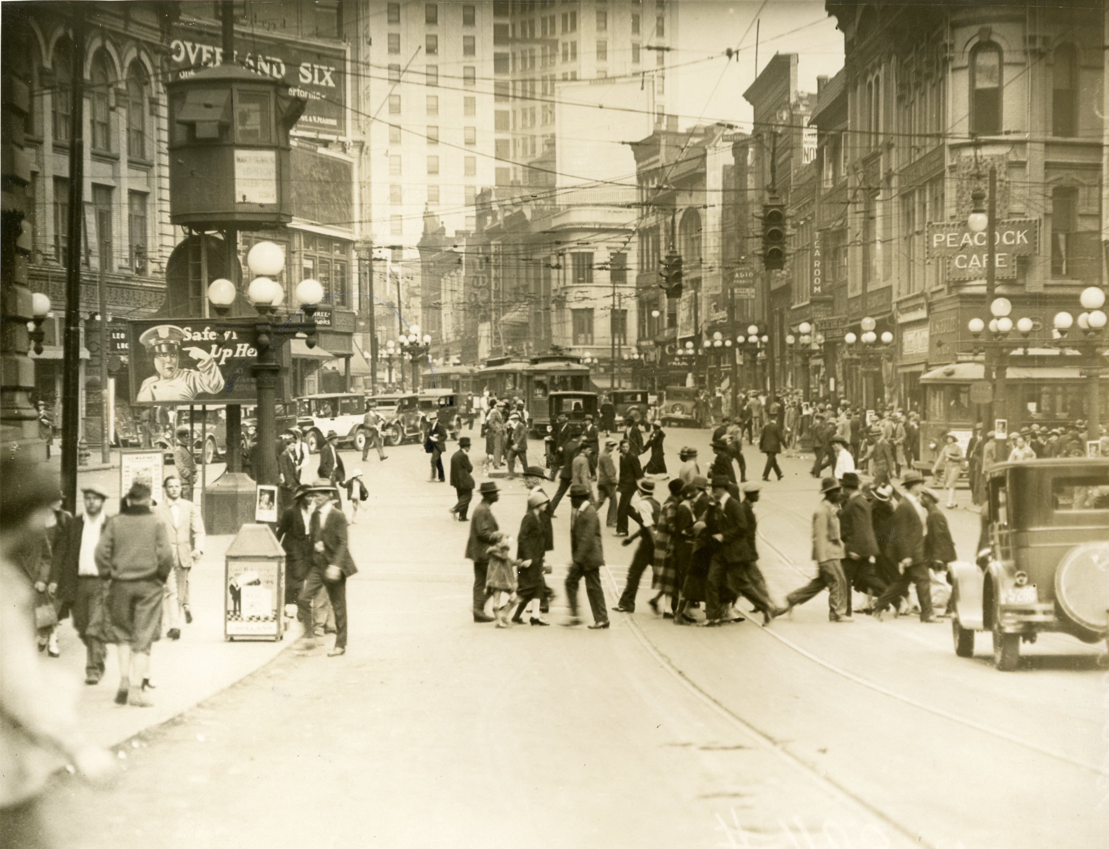 Pedestrians, autos and street cars converged on Peachtree Street in Five Points downtown in the 1920s, just as they do today. AJC PHOTO ARCHIVES