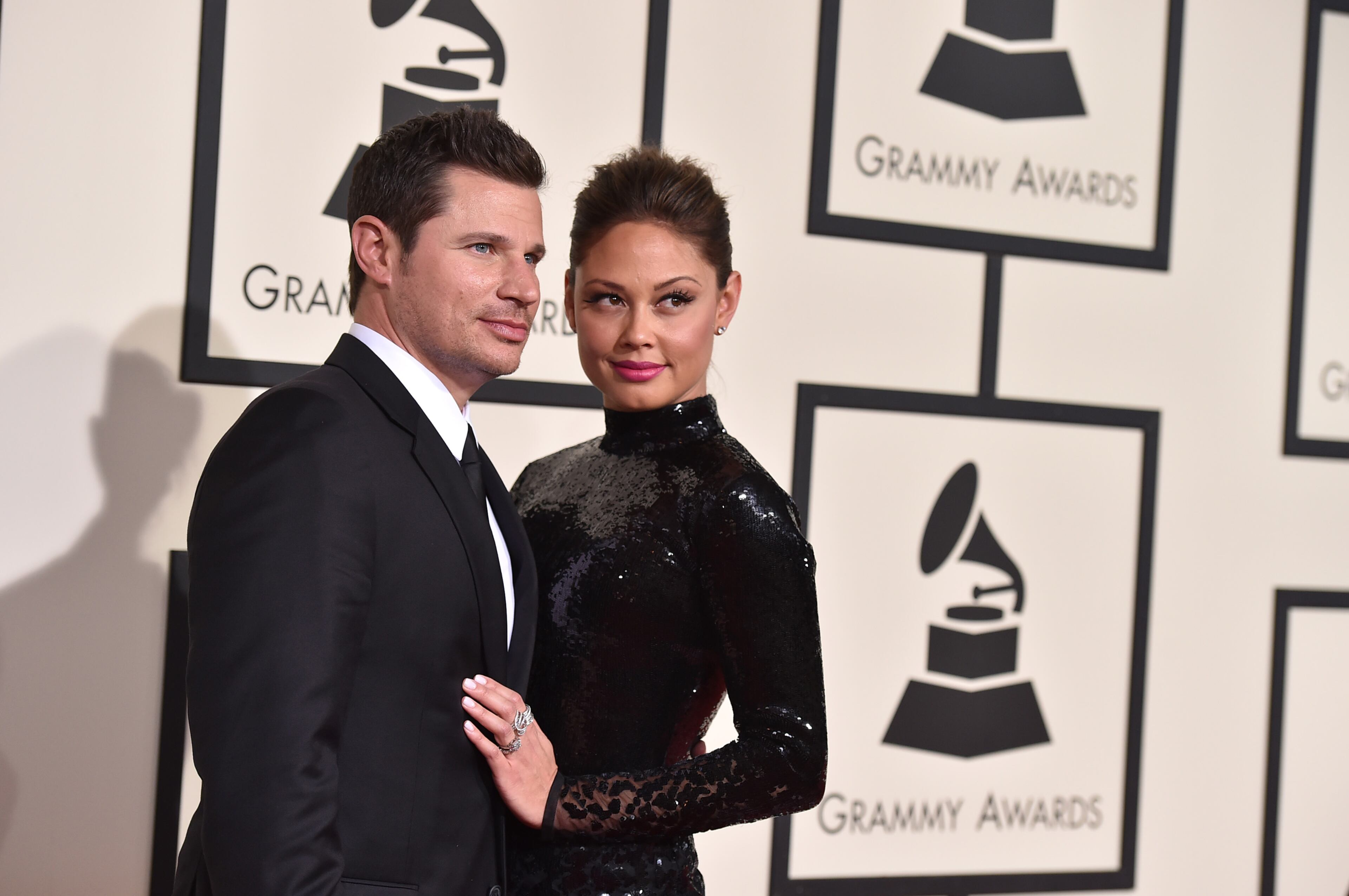 Nick Lachey, left, and Vanessa Lachey arrive at the 58th annual Grammy Awards at the Staples Center on Monday, Feb. 15, 2016, in Los Angeles. (Photo by Jordan Strauss/Invision/AP)
